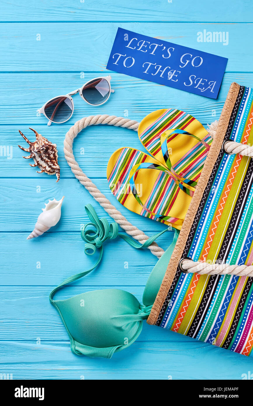 Set of beach accessories, handbag. Luxury beach fashion, blue