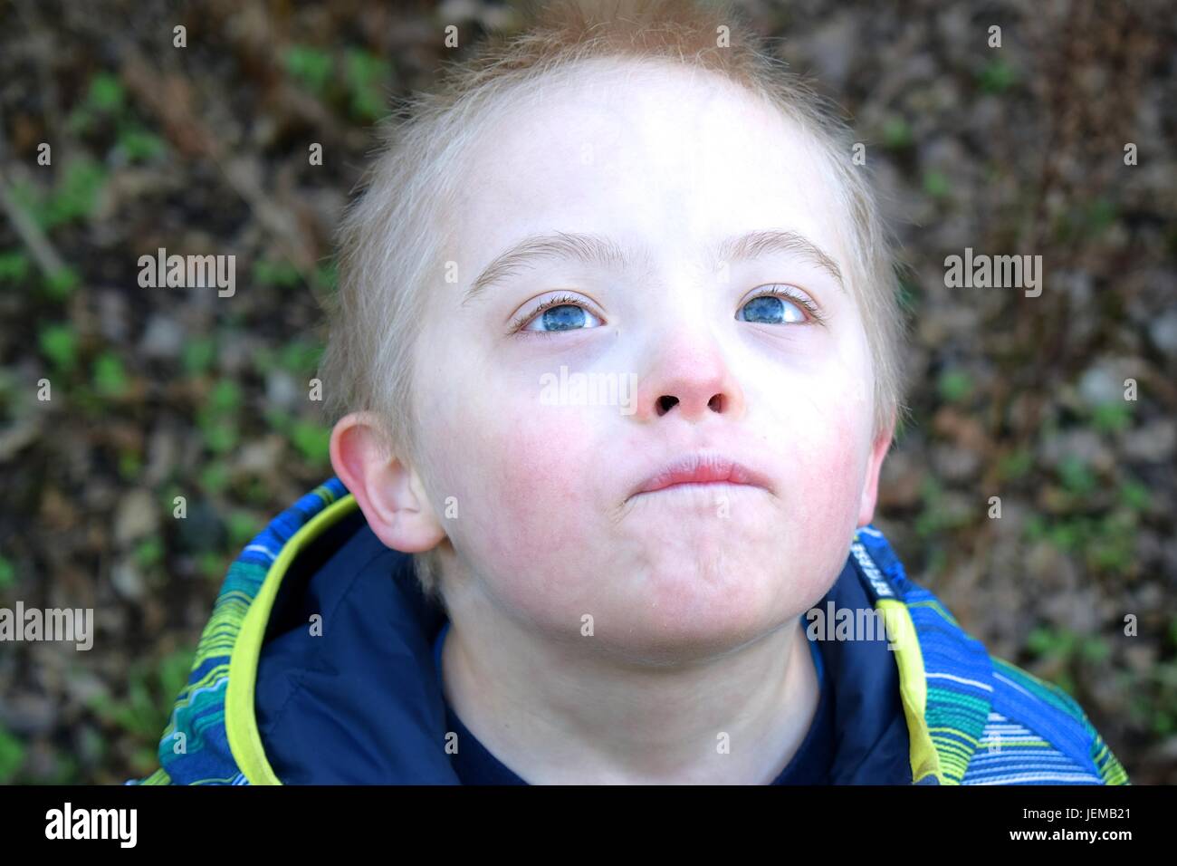 Portrait Down Syndrome Boy Boring Stock Photo 558506104