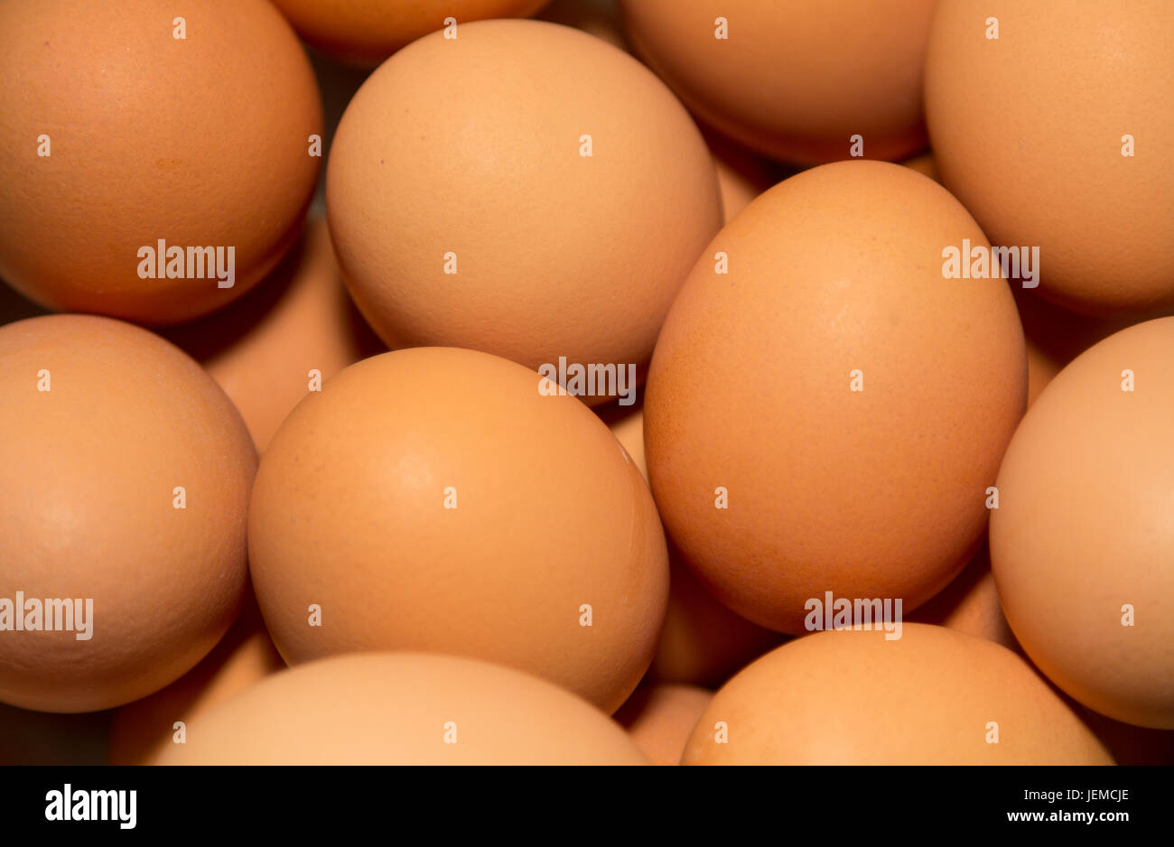 Bowl of brown eggs, bowl not visible. Stock Photo