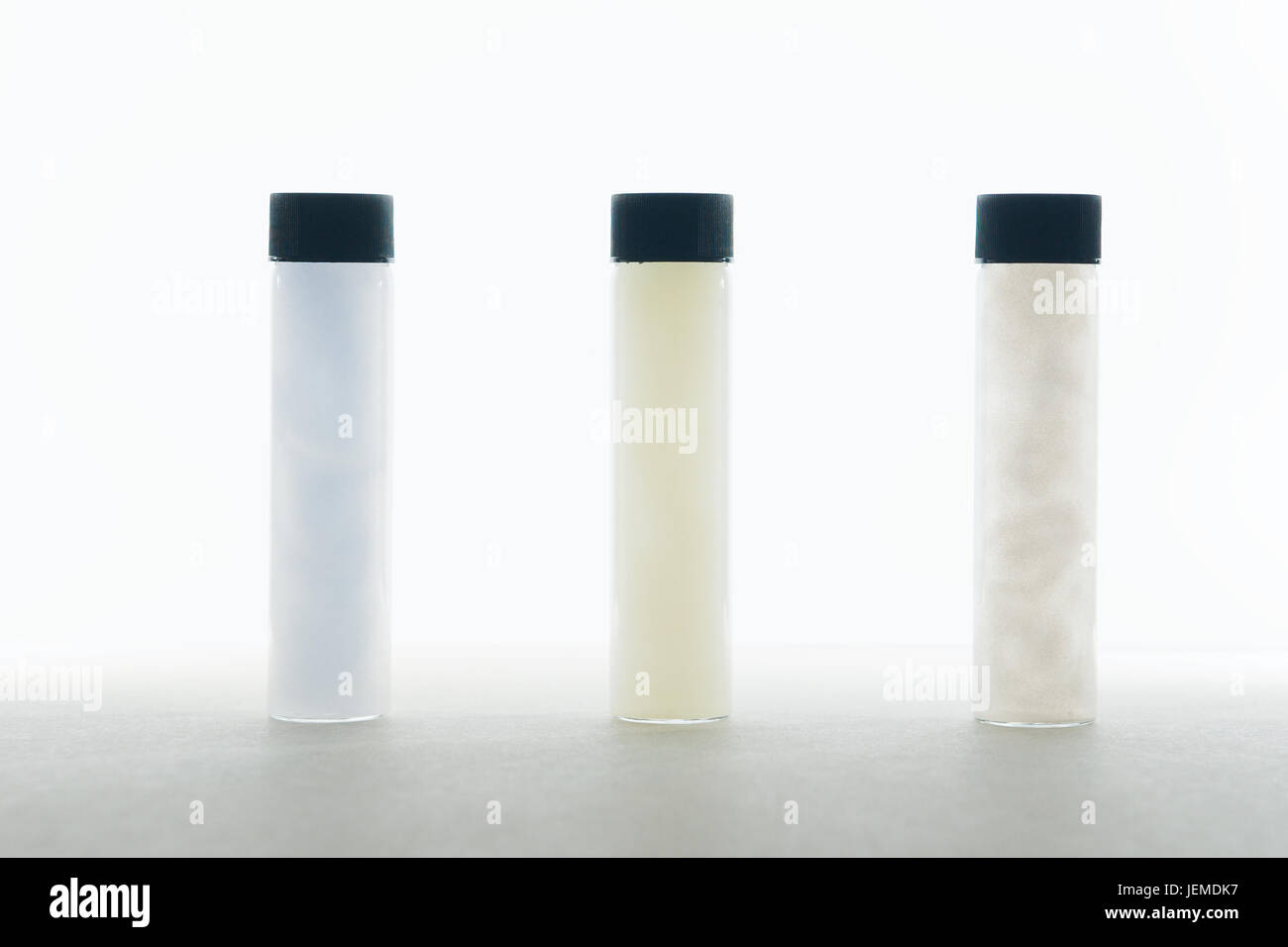 Small glass tube with a lid containing coloured liquid Stock Photo Alamy