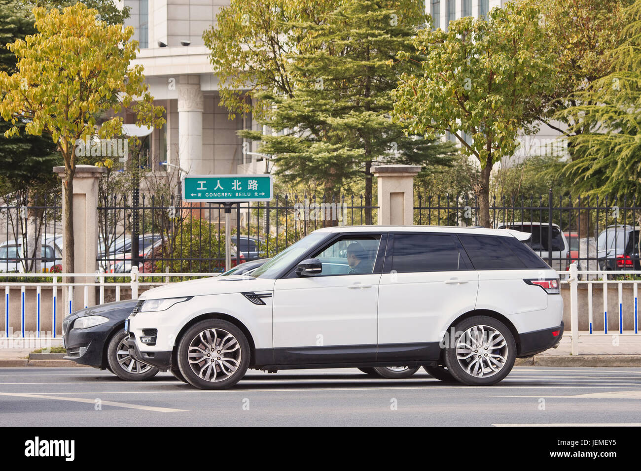White Range Rover sport. Jaguar Land Rover posted a 24% sales drop in China, caused by economic slowdown and government crack-down on official spending Stock Photo
