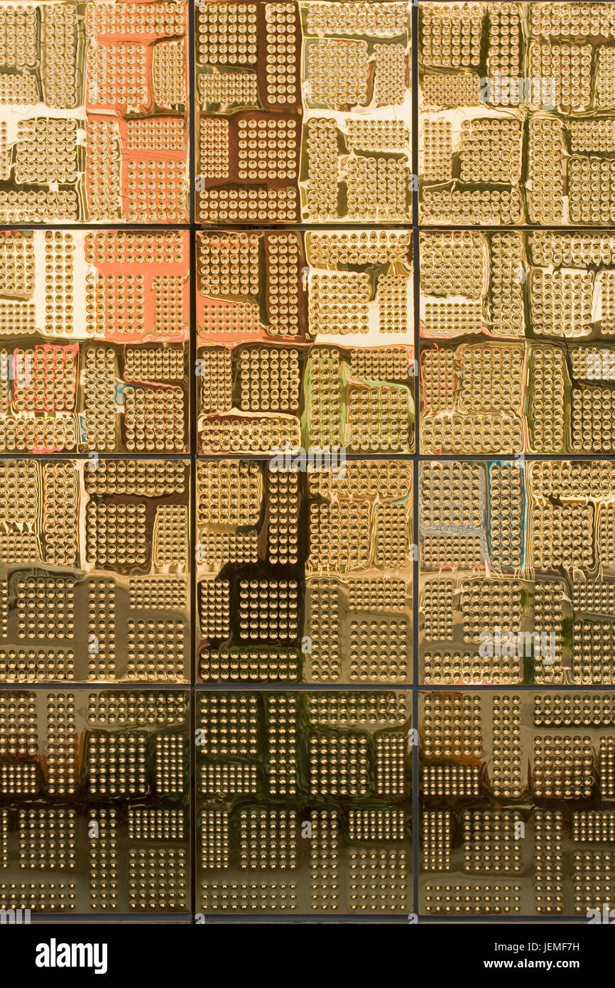 Shiny golden ceramic tiles with a design pattern Stock Photo