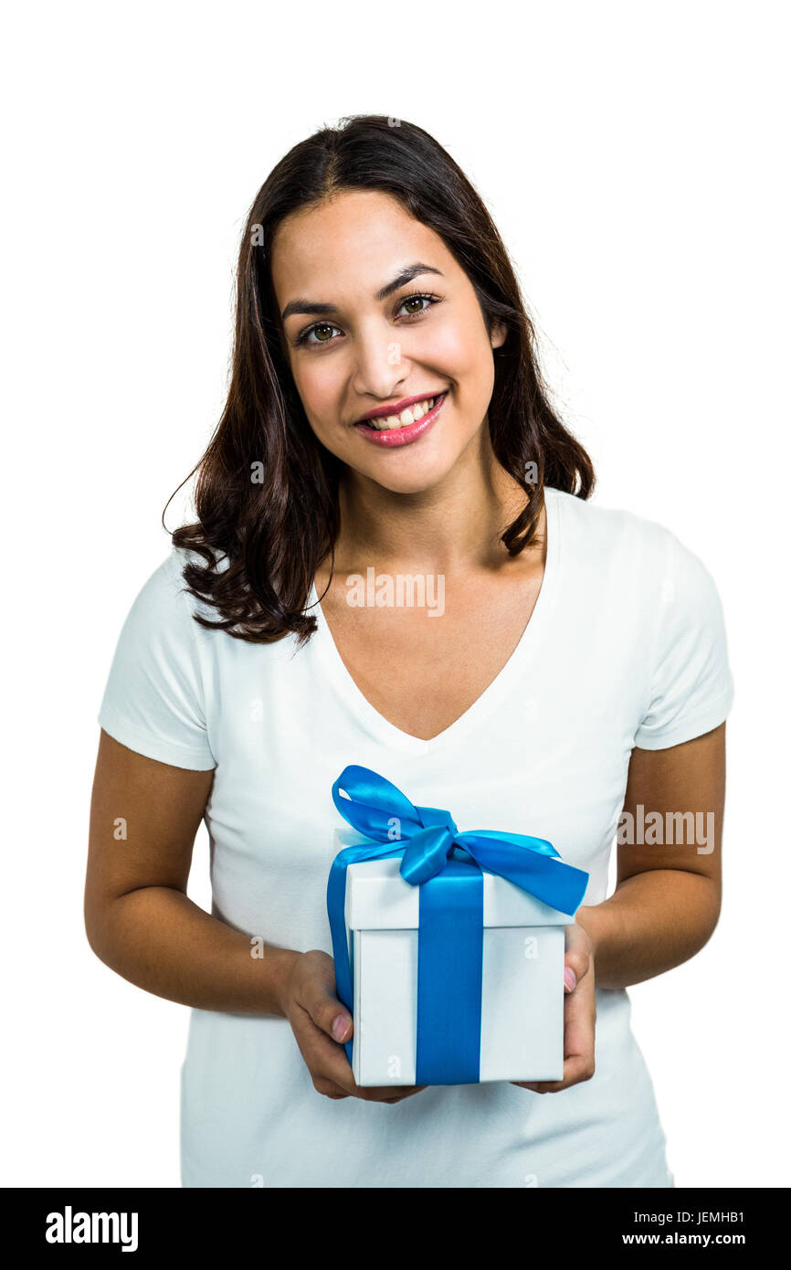 Portrait of young woman holding gift box Stock Photo - Alamy