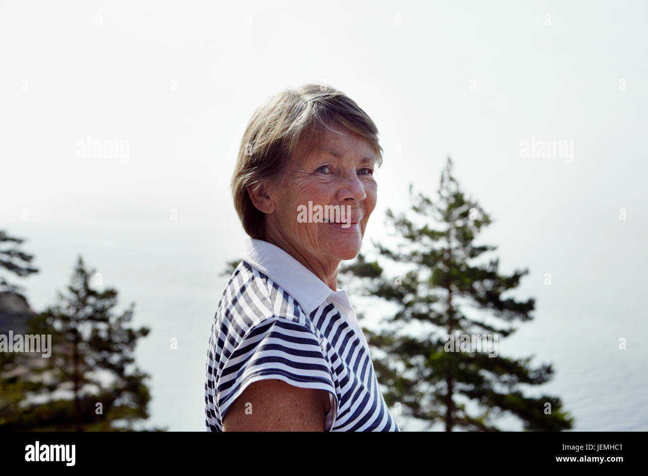 Portrait senior tanned smiling woman hi-res stock photography and ...