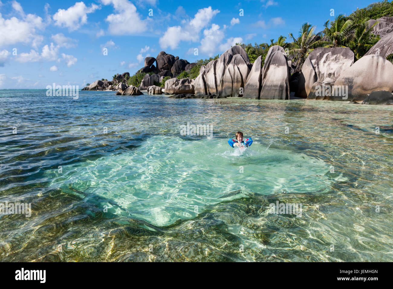Boy swimming in sea Stock Photo - Alamy