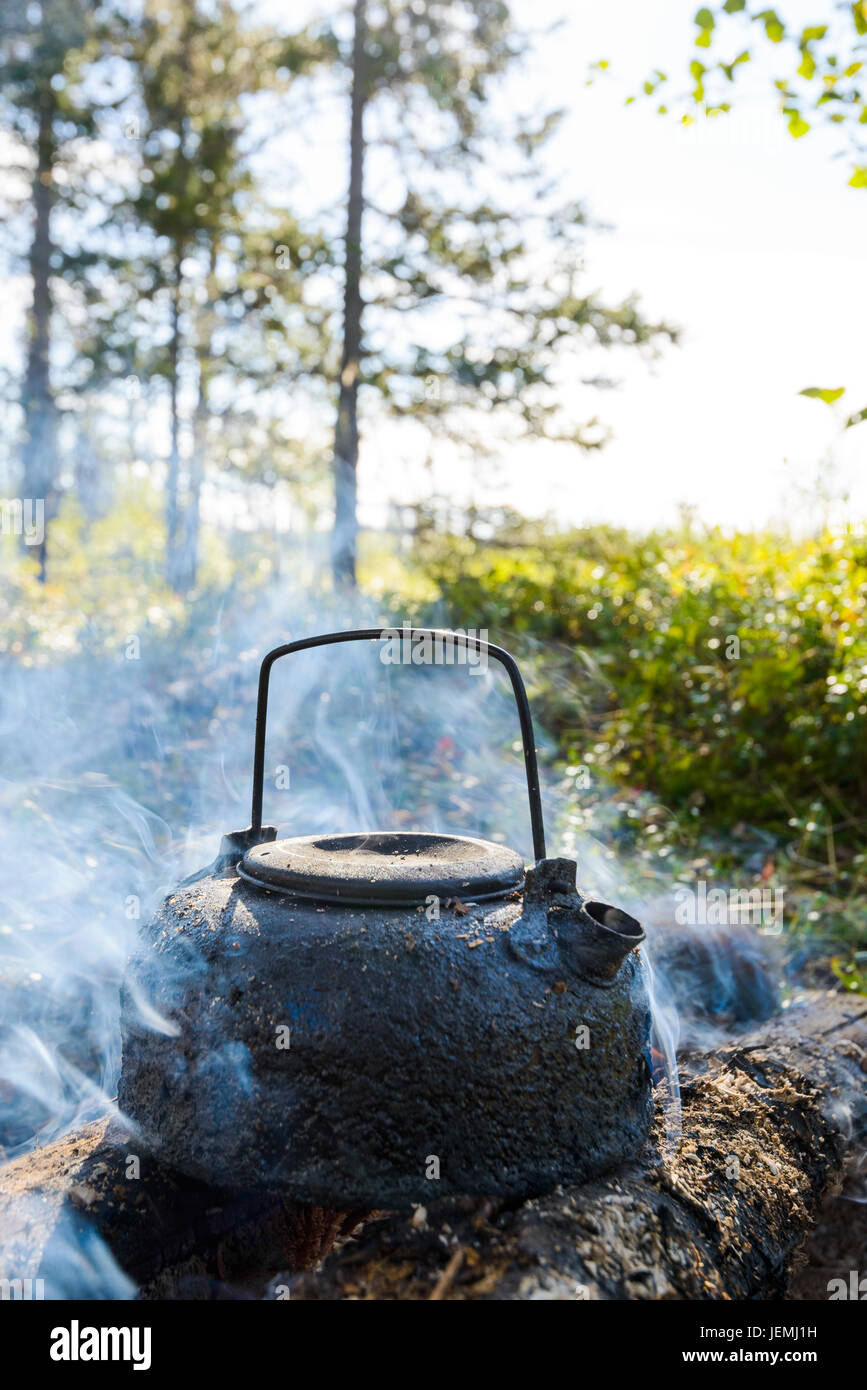 Kettle on campfire Stock Photo Alamy