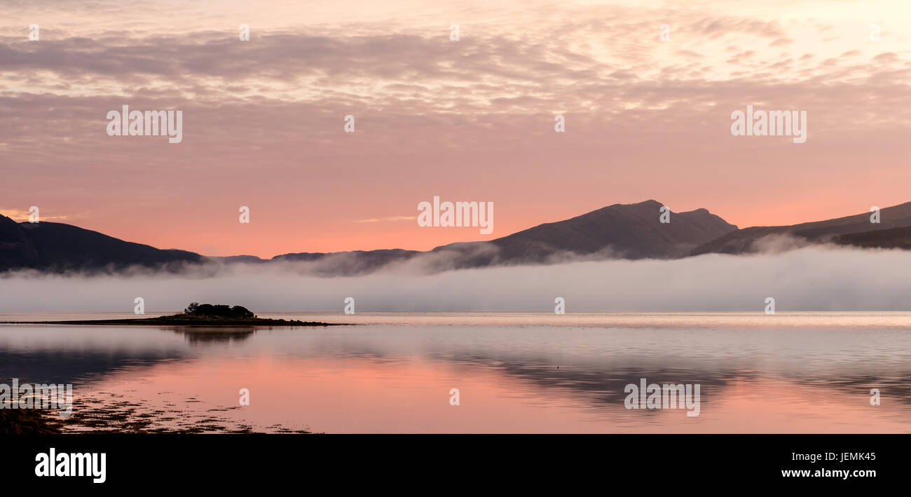A misty sunrise over Loch Fyne from Inveraray Stock Photo
