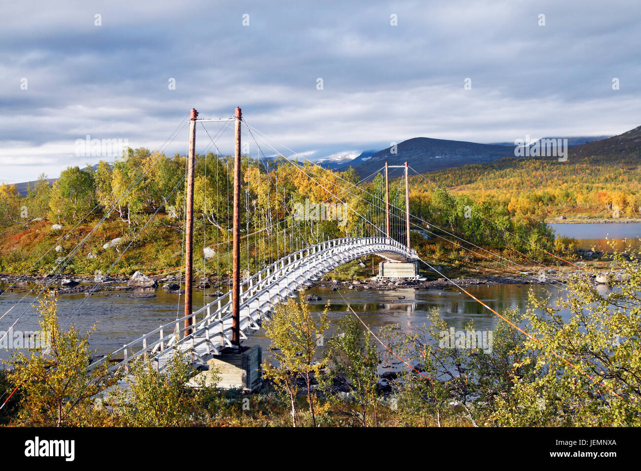 Footbridge above river Stock Photo - Alamy