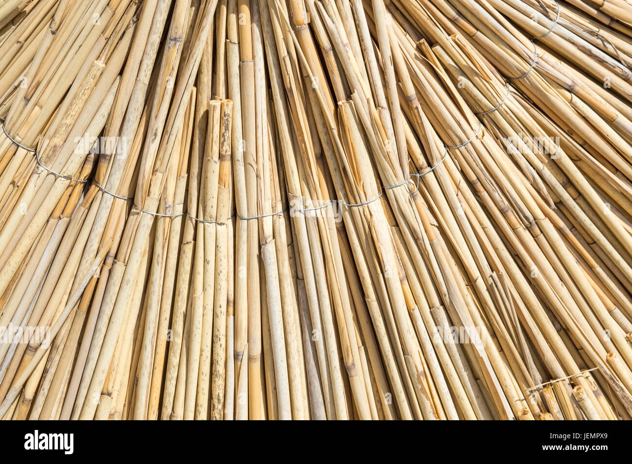 Texture of straw beach umbrella close up Stock Photo