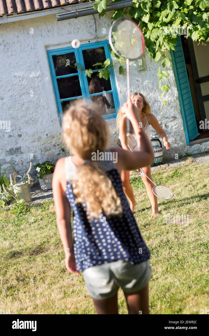 Girls playing badminton Stock Photo