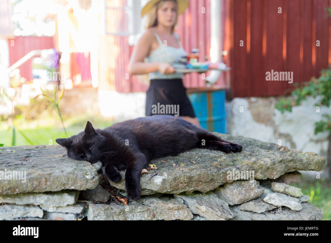 Woman sleeping on stone wall hires stock photography and images Alamy