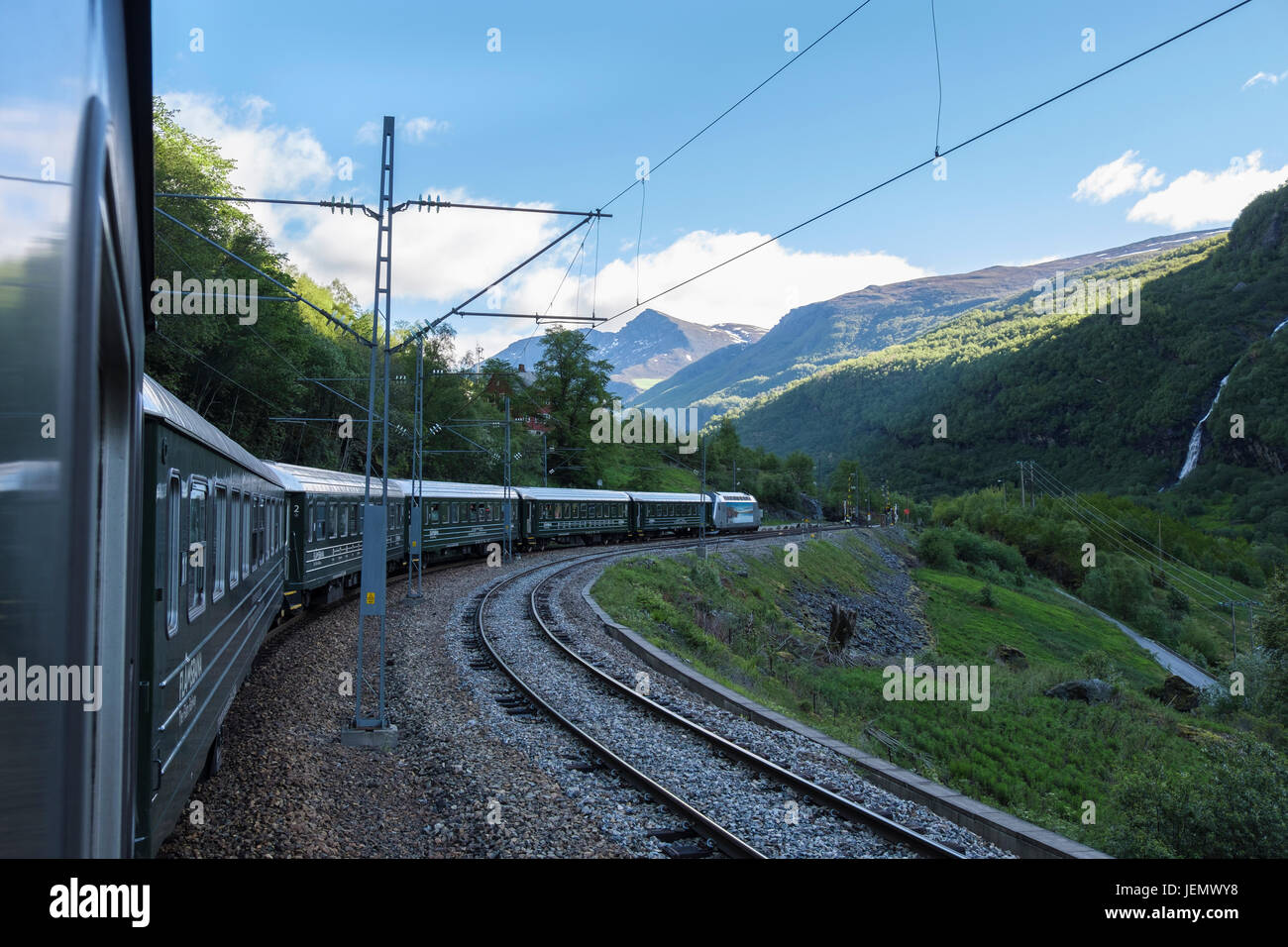 Flamsbana or Flam Railway train on a bend in scenic Flåmsdalen valley. Aurland, Norway, Scandinavia, Europe Stock Photo