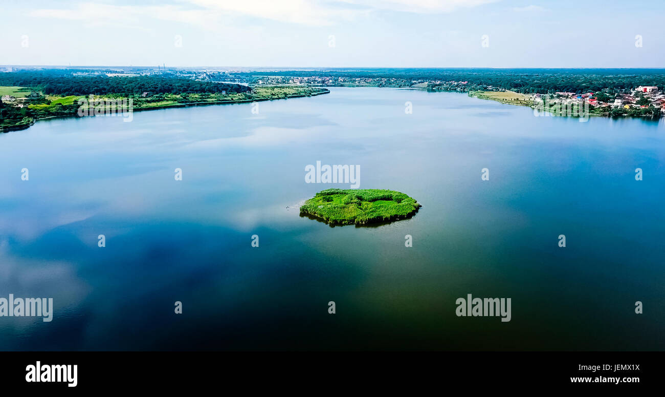 Aerial Drone View Of Small Green Island Lake On Blue Sky In Summer ...