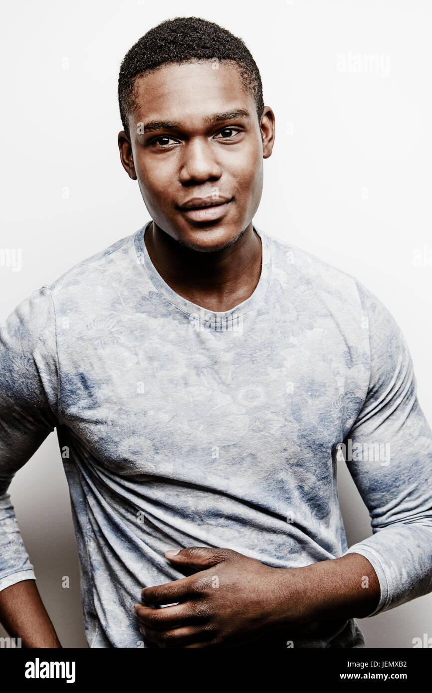 Portrait of young man, studio shot Stock Photo - Alamy