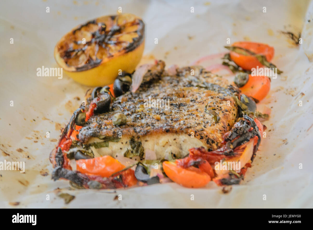 Sea bass Al Cartoccio fresh sea bass fillet cooked in parchment paper