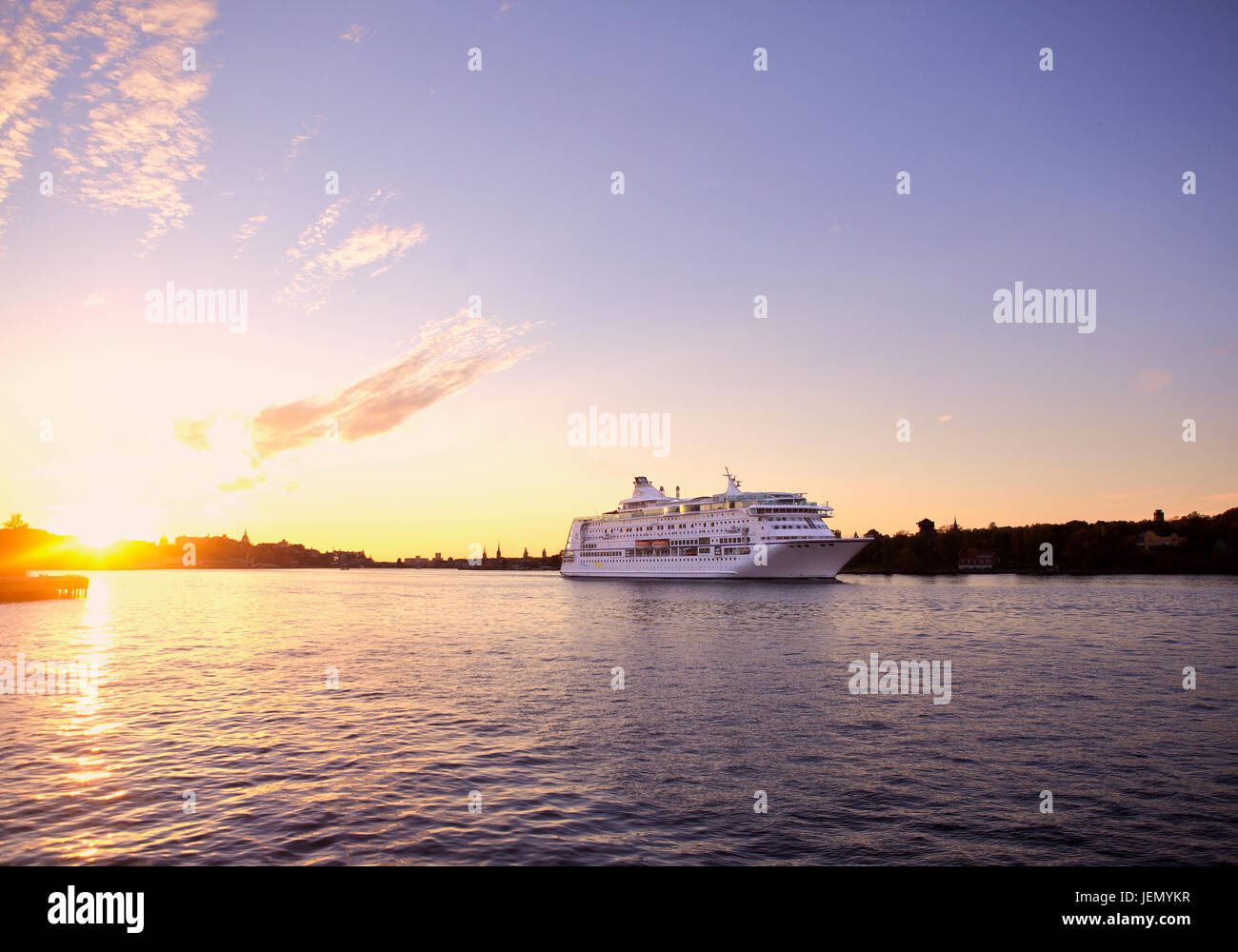 Cruise ship at sea, dusk Stock Photo - Alamy