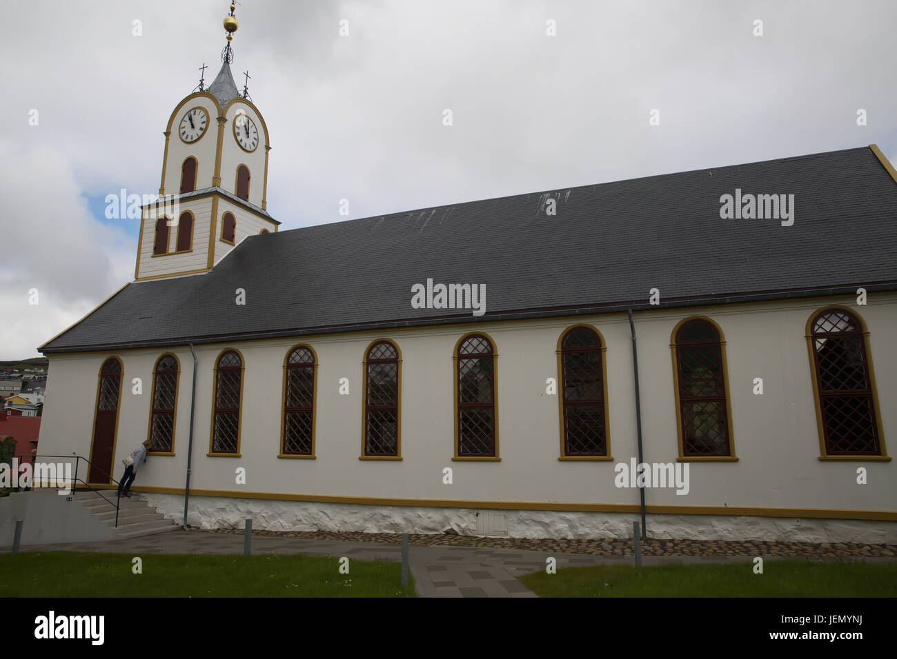 Thorshavn cathedral in the Faroe Islands. The Cruise Ship, Azura, makes its maiden visit to The Faroe Islands. It's the largest cruise ship to visit the port . Stock Photo