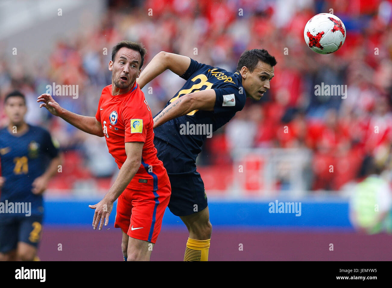 MOSCOU, MO - 25.06.2017: CHILE VS AUSTRALIA - FUENZALIDA Jose of Chile wrangles ball with IRVINE Jackson of Australia during Chile-Australia match valid for the third round of the 2017 Confederations Cup on Sunday (25th) held at the Spartak Stadium (Otkrytie Arena) in Moscow, Russia. (Photo: Marcelo Machado de Melo/Fotoarena) Stock Photo