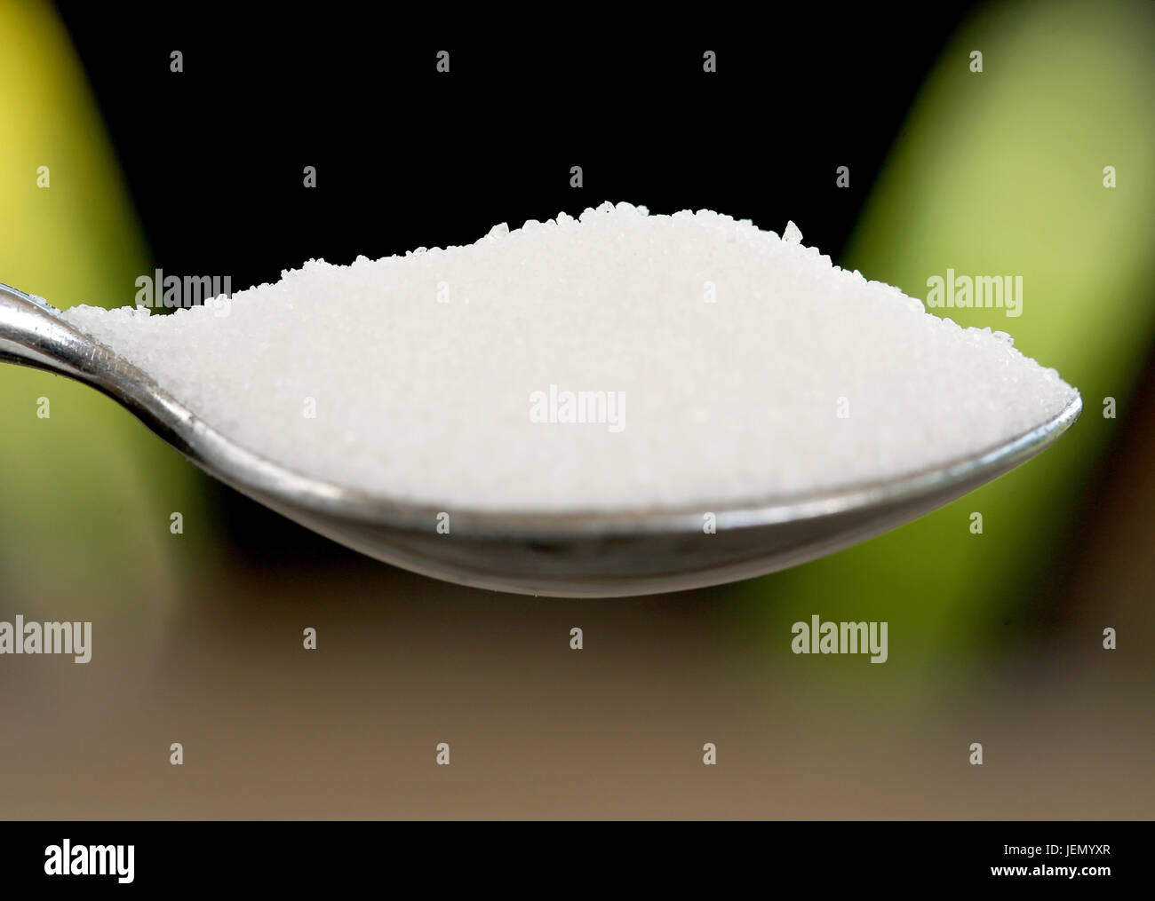 A spoon full of sugar can be seen in Essen, Germany, 26 June 2017. From the 1st of October onwards some seminal elements of the EU sugar market regualtions will become void. For example, export restrictions will cease for EU sugar producers. Photo: Roland Weihrauch/dpa Stock Photo