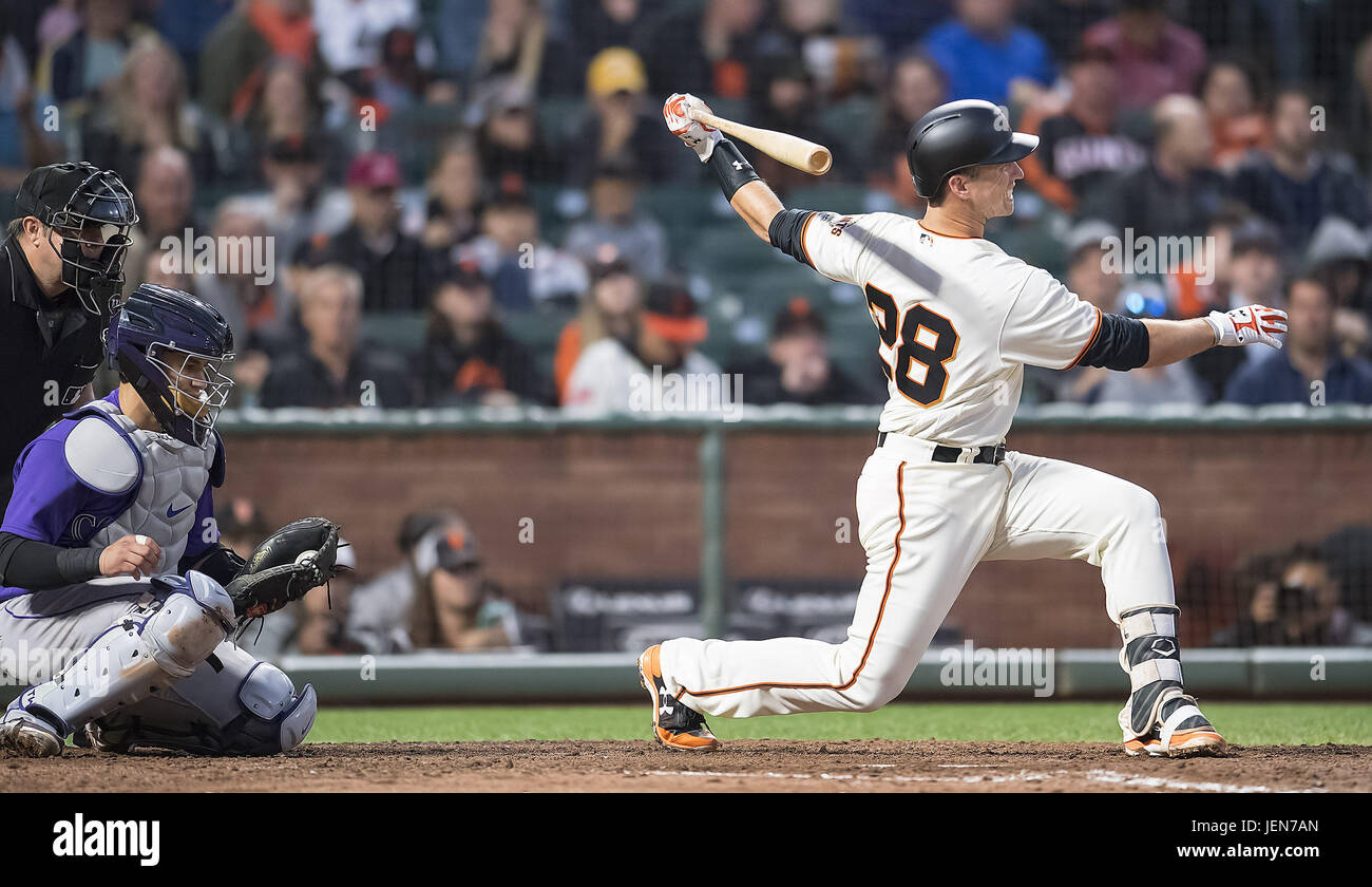 San Francisco, California, USA. 26th June, 2017. Swinging hard, lead off hitter of the fifth inning, San Francisco Giants catcher Buster Posey (28), during a MLB baseball game between the Colorado Rockies and the San Francisco Giants on LGBT Night at AT&T Park in San Francisco, California. Valerie Shoaps/CSM/Alamy Live News Stock Photo