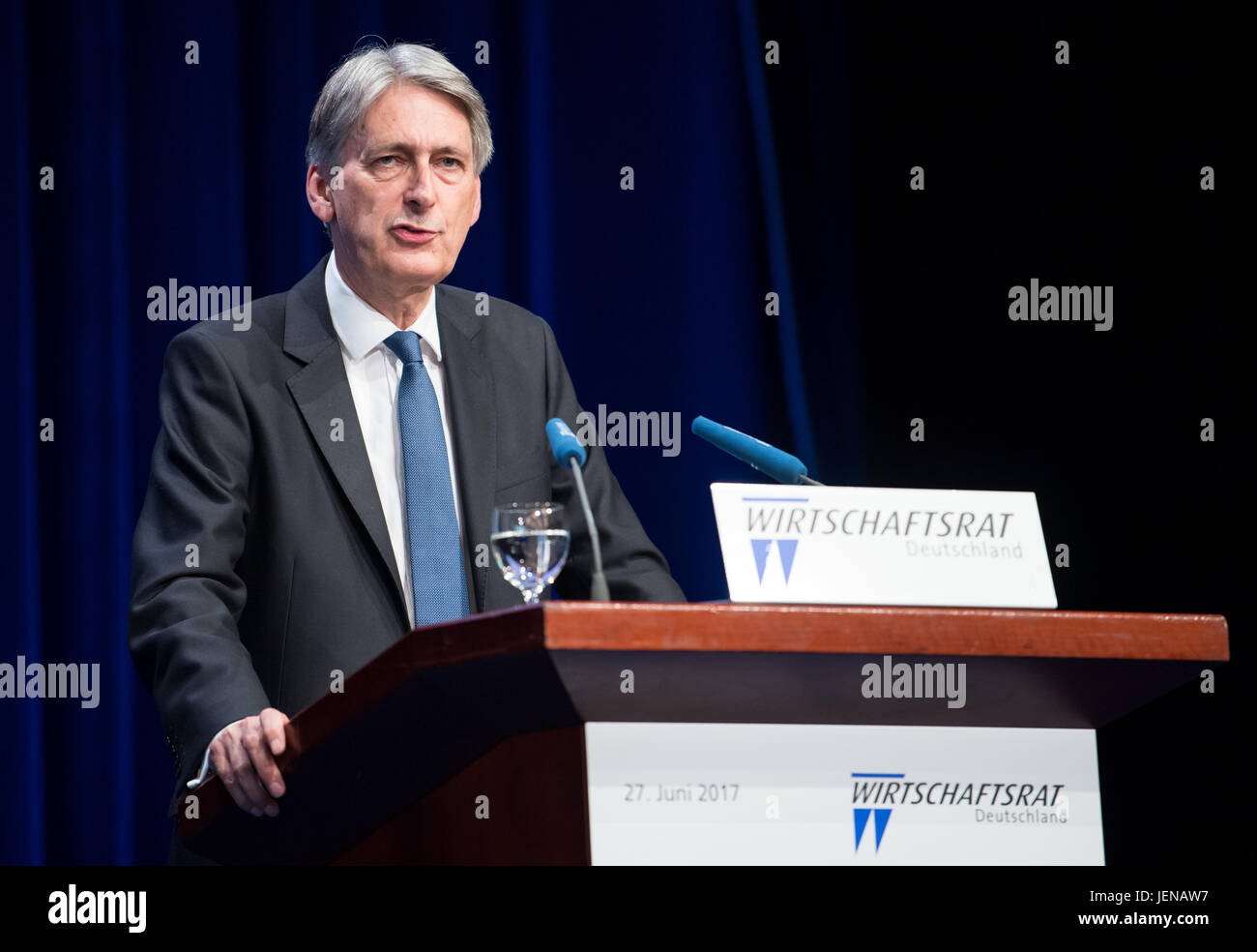 Berlin, Germany. 27th June, 2017. British Minister of Finance Philip Hammond speaks during the Economy Day of the Economic Council of the Christian-Democratic Union (CDU) in Berlin, Germany, 27 June 2017. Around 3,500 representatives from politics, economy and science participate in the event with the motto 'Welt im Wandel : Fuer Freiheit und Sicherheit' (lit. 'Changing World : For Freedom and Security'). Photo: Bernd von Jutrczenka/dpa/Alamy Live News Stock Photo