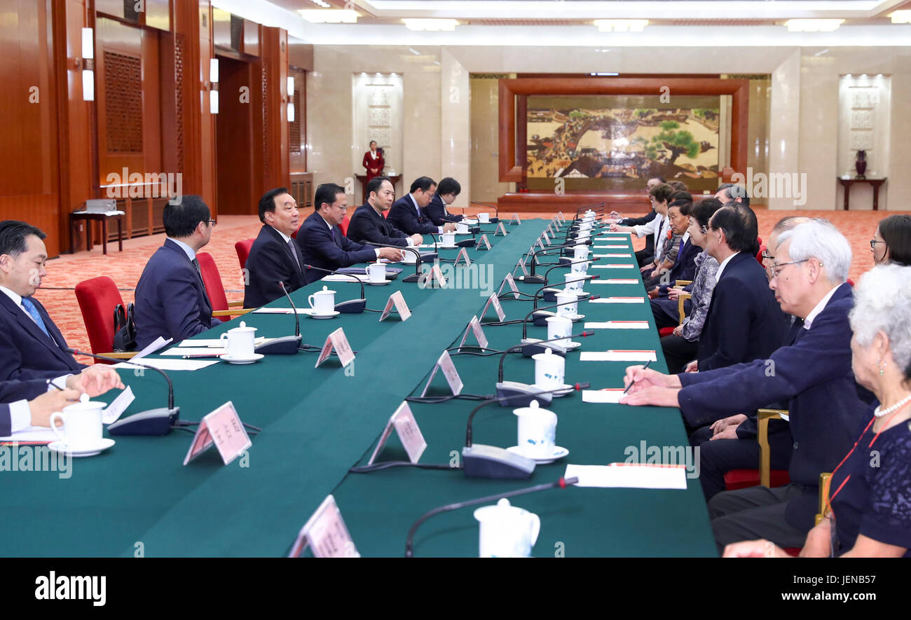 Beijing, China. 27th June, 2017. Wang Chen, vice chairman of the National People's Congress (NPC) Standing Committee, meets with a Japanese delegation of the association of friendship of repatriates from China led by its director Sumie Ikeda in Beijing, capital of China, June 27, 2017. Credit: Xie Huanchi/Xinhua/Alamy Live News Stock Photo