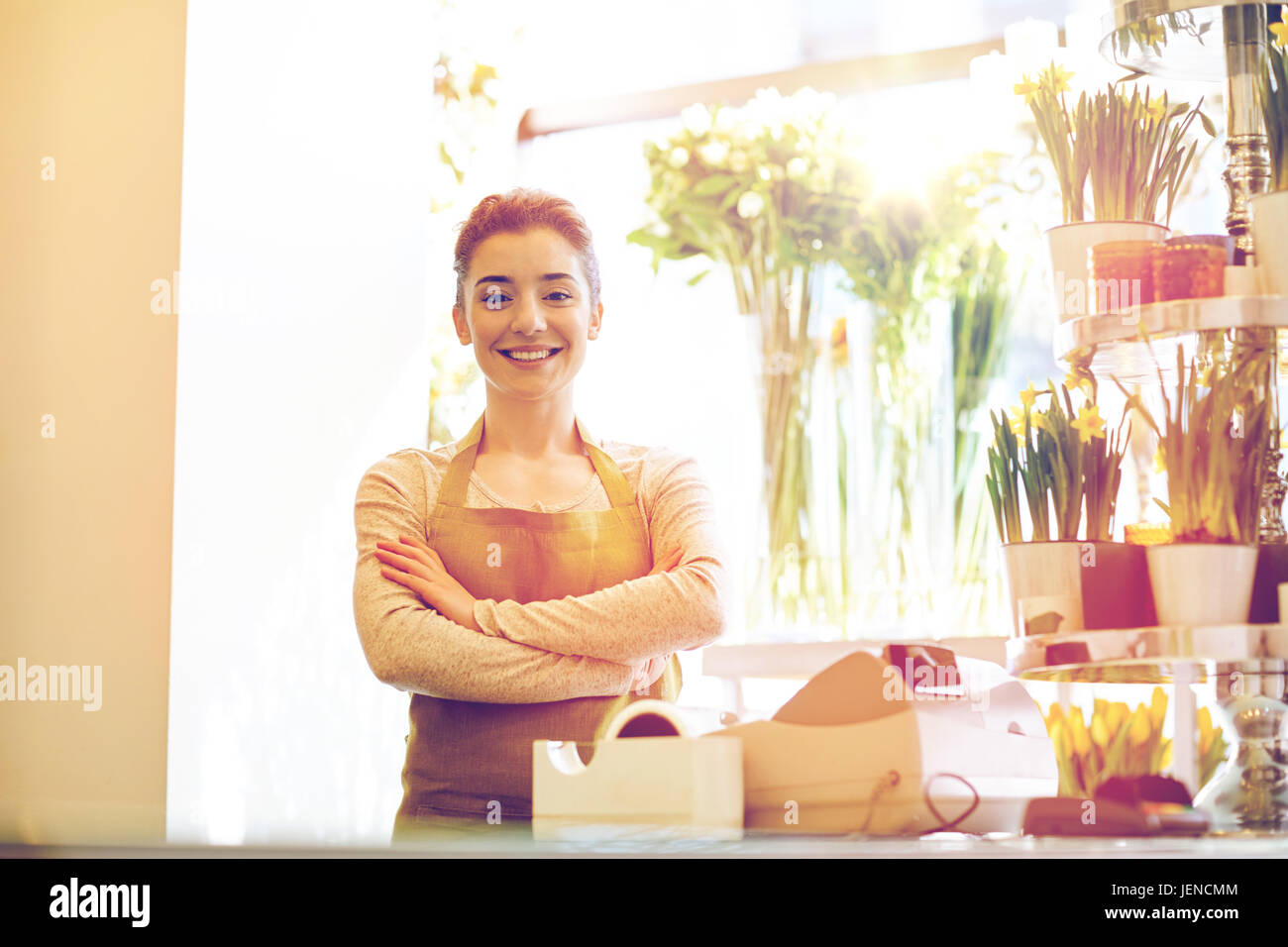 smiling florist woman at flower shop cashbox Stock Photo - Alamy