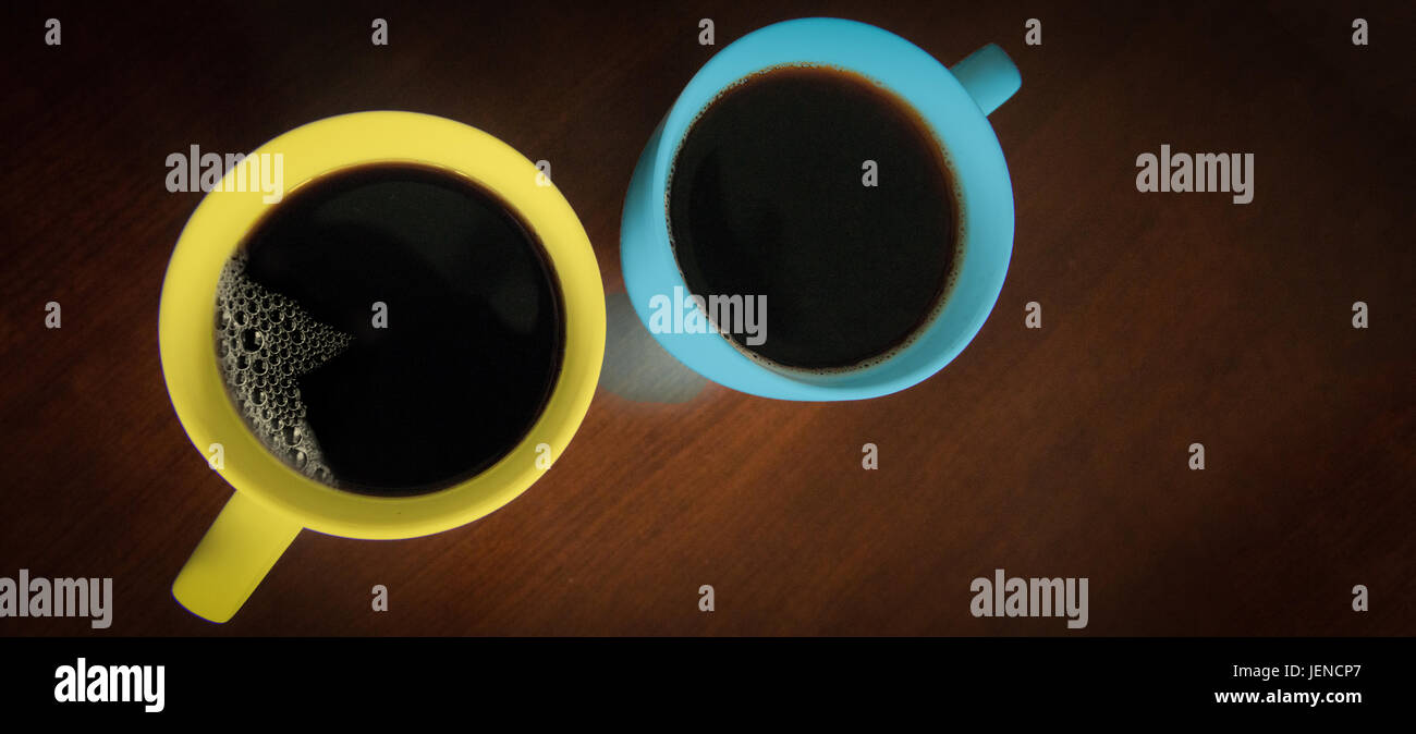 Overhead view of two cups of coffee Stock Photo Alamy