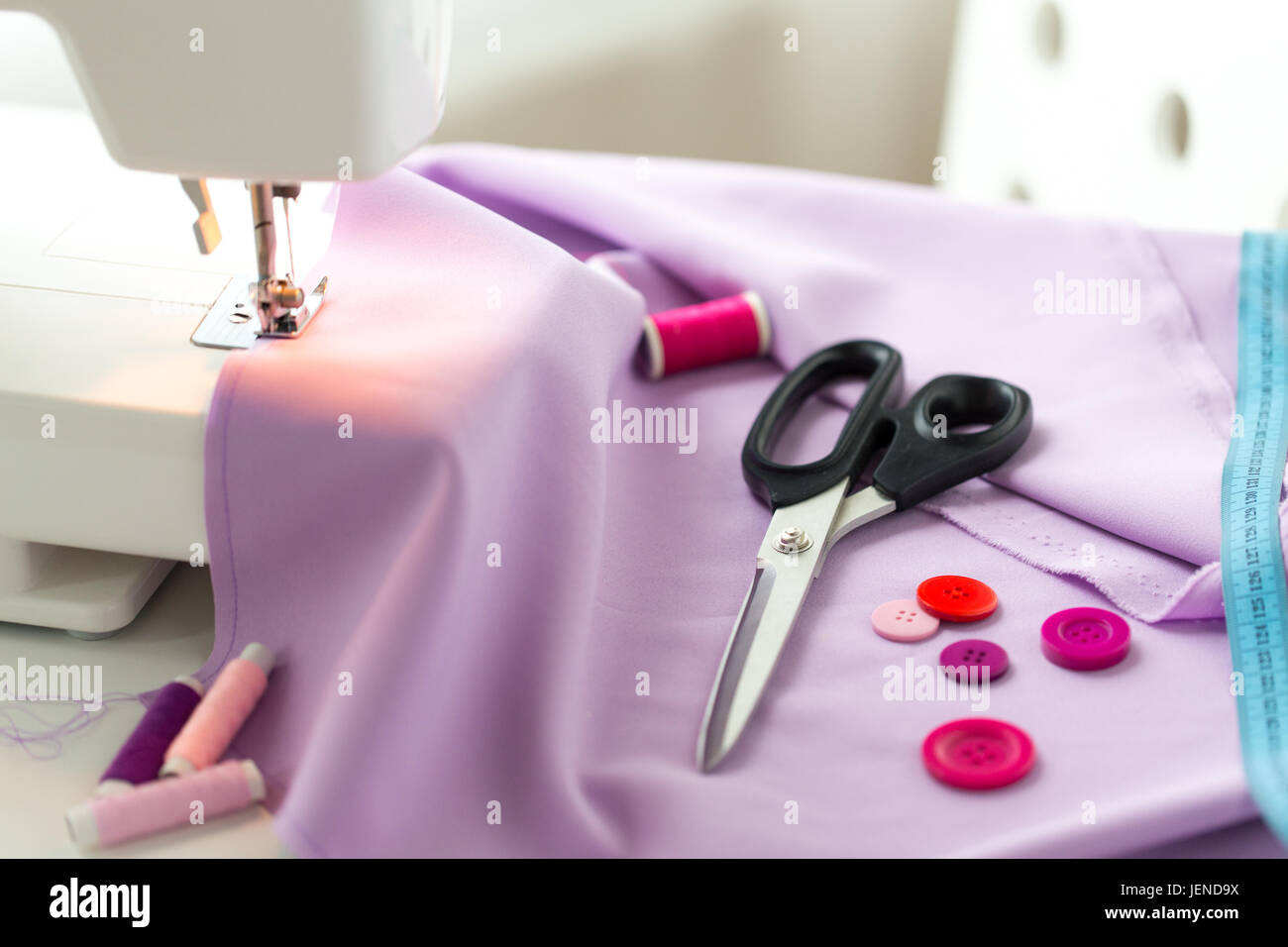 sewing machine, scissors, buttons and fabric Stock Photo Alamy