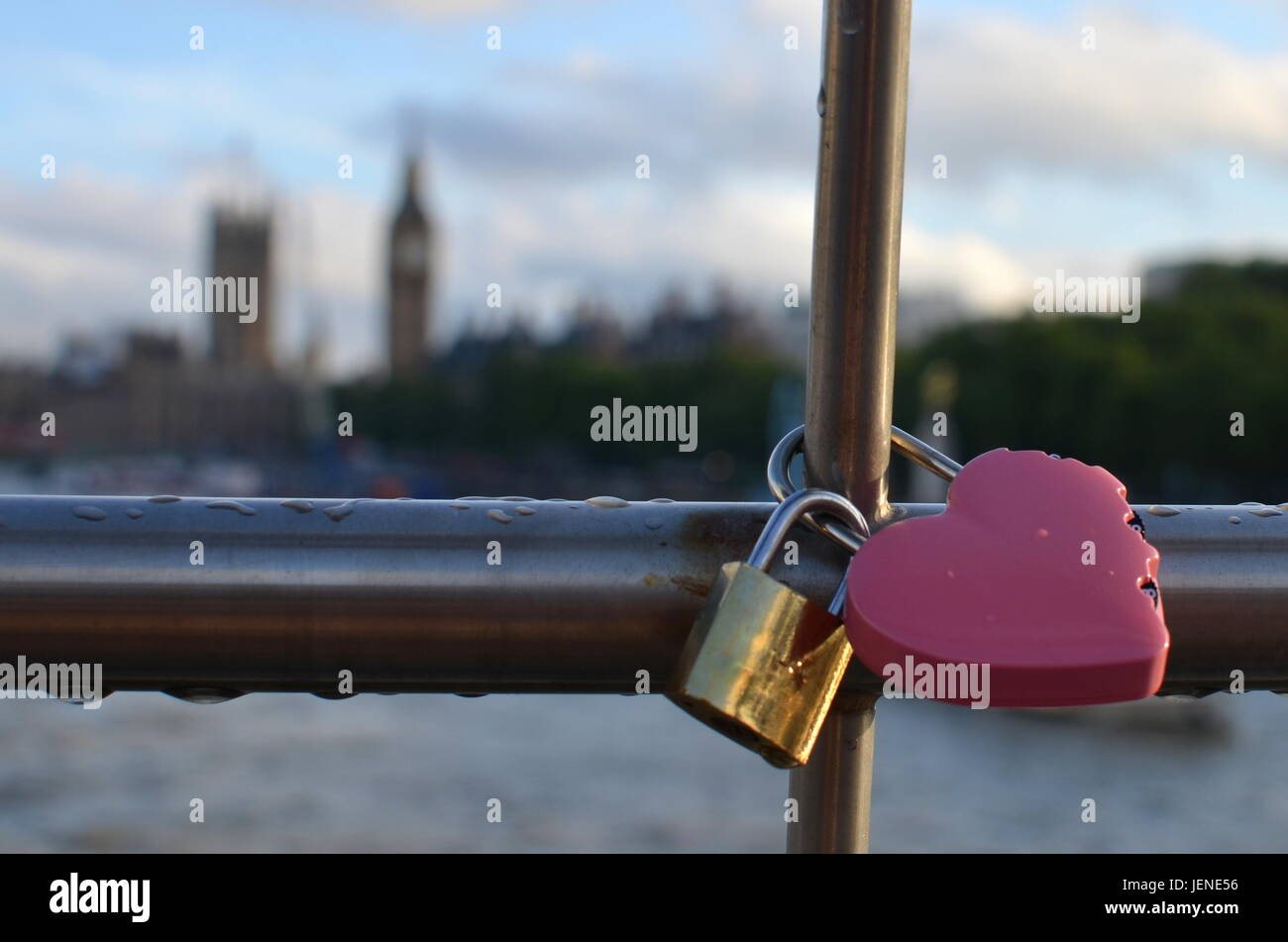 Heart shaped padlock locked on a bridge, London, England, United