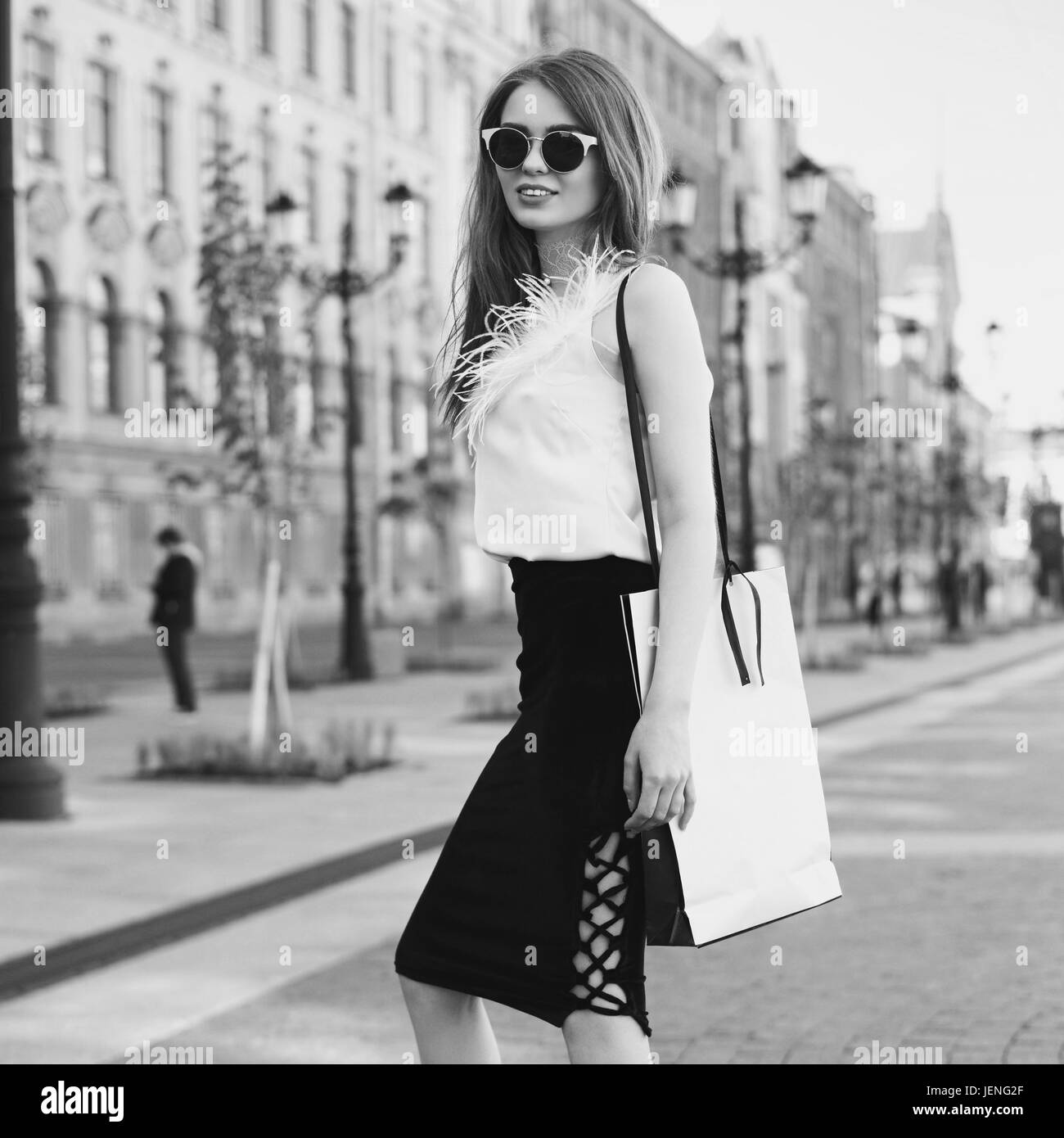 Stylish girl with shopping bag Stock Photo