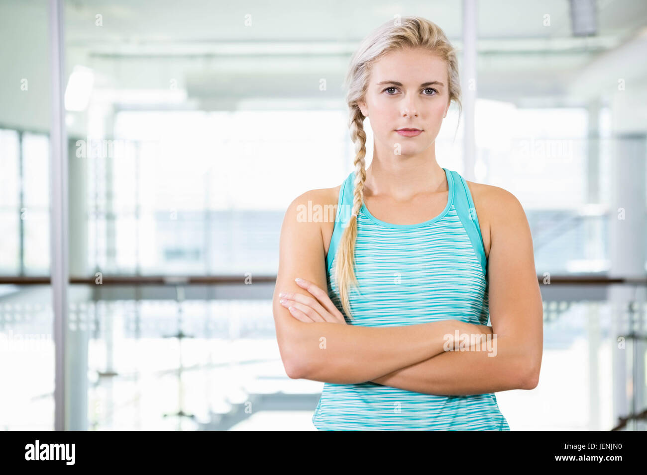 Blonde woman crossed arms serious hi-res stock photography and images ...
