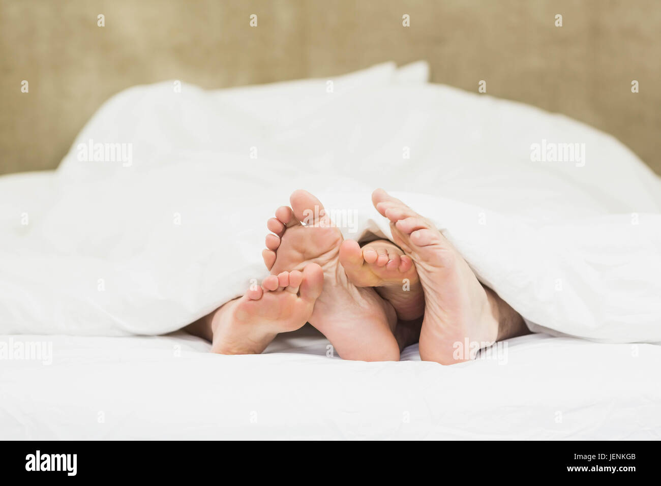 Close up of couples feet Stock Photo