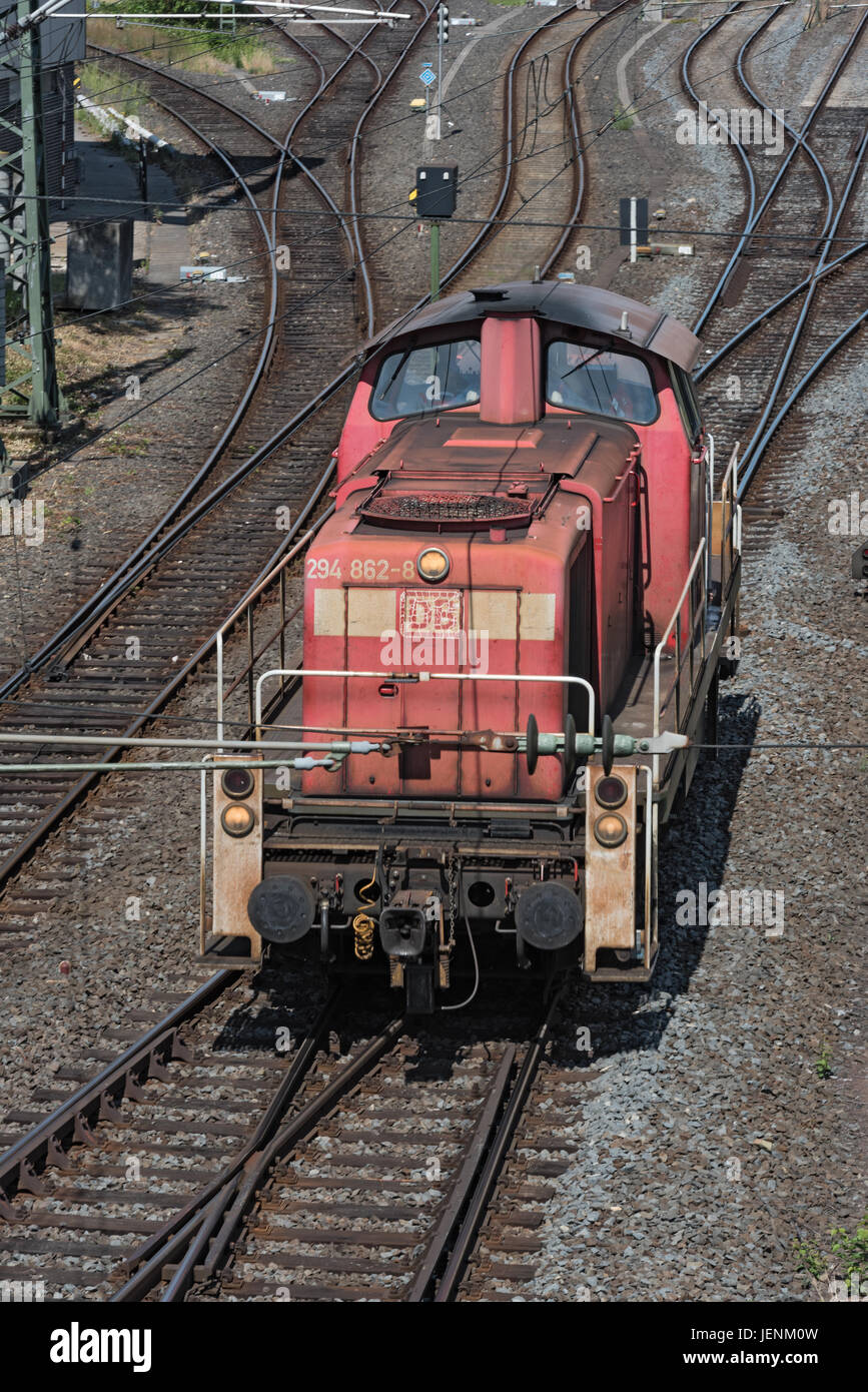 Older red diesel locomotive at the station Stock Photo