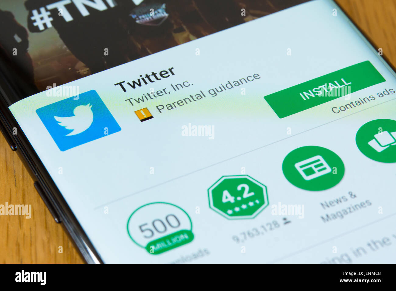 A closeup on the Twitter app install screen on a smartphone Stock Photo