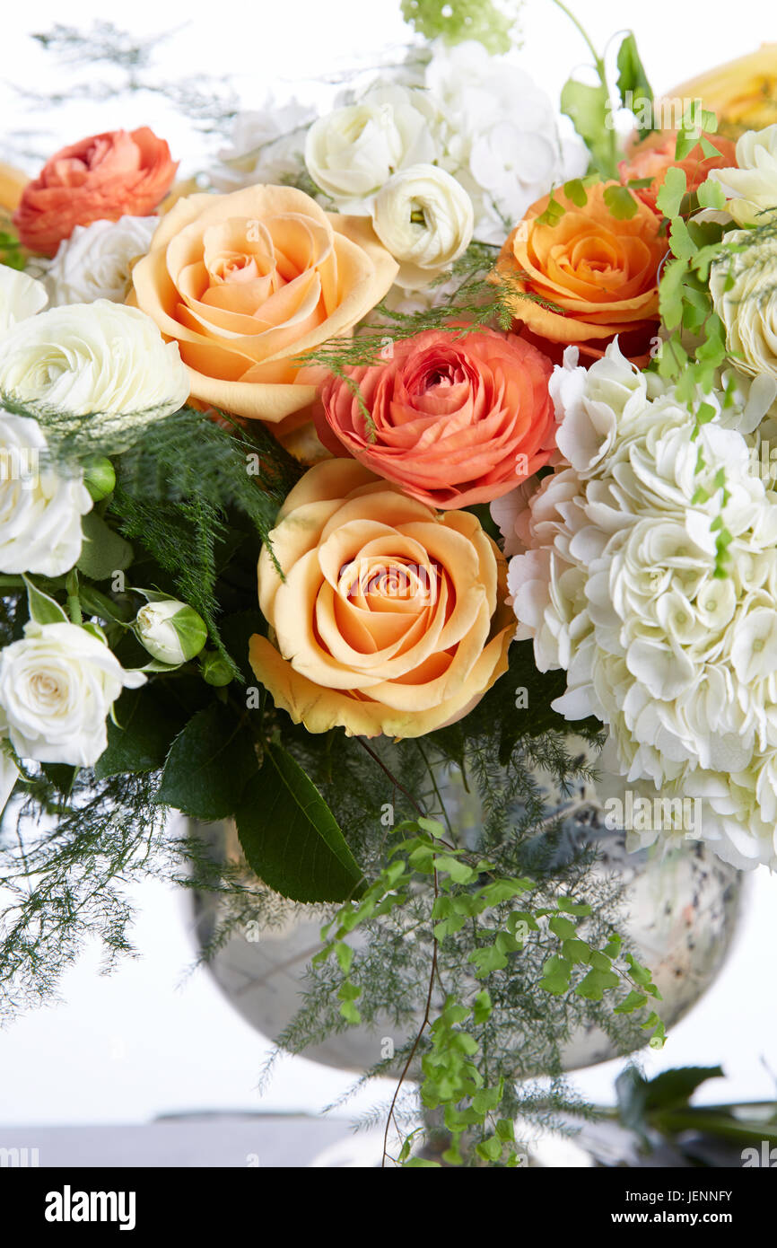 Wedding bouquet with white and light orange flowers centerpeice Stock Photo