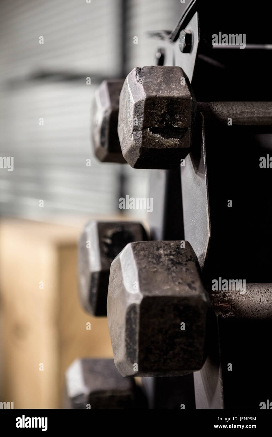 Close up of dumbbells rack Stock Photo - Alamy