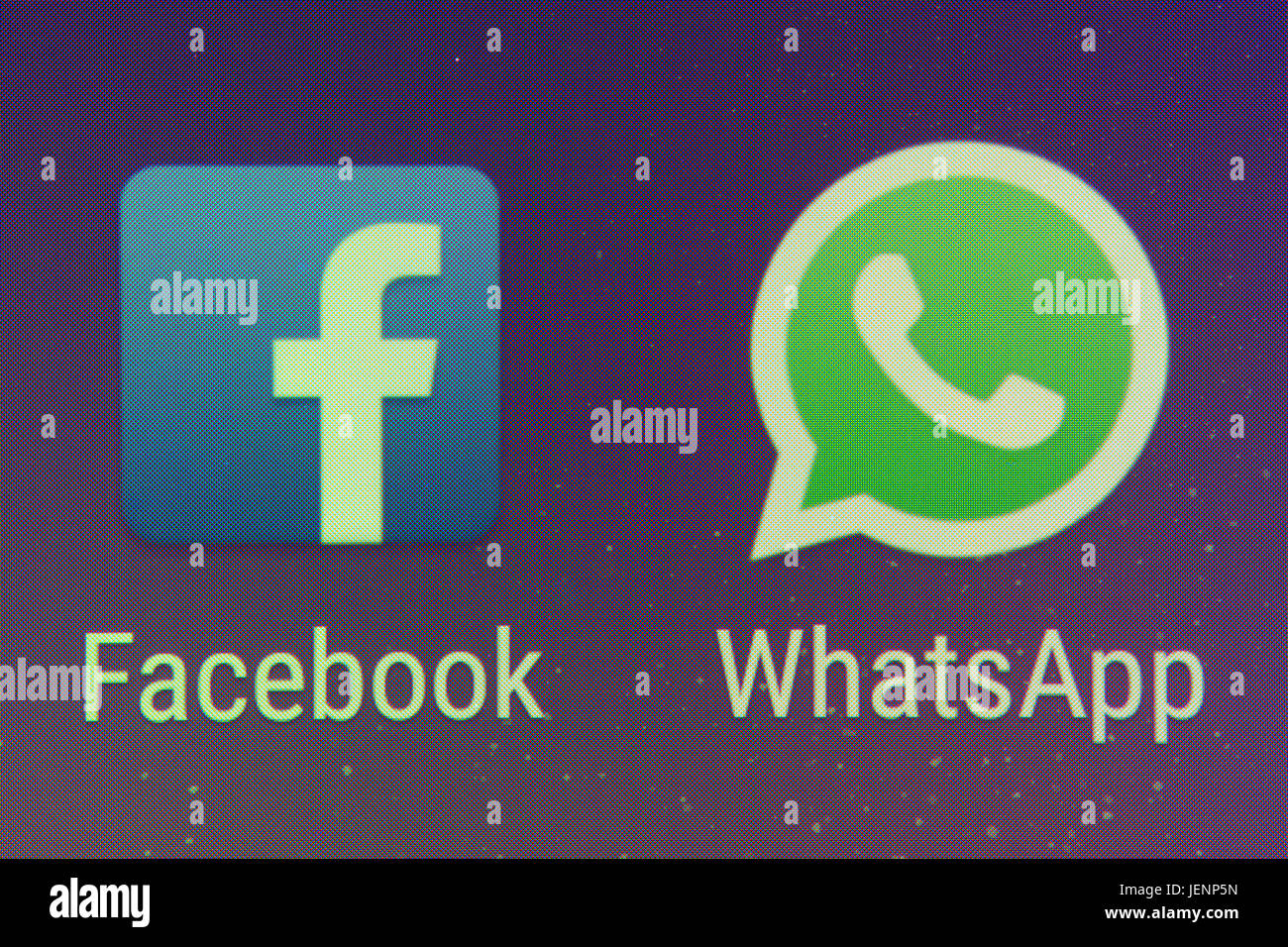 A closeup of the Facebook and WhatsApp apps on a smartphone screen Stock Photo
