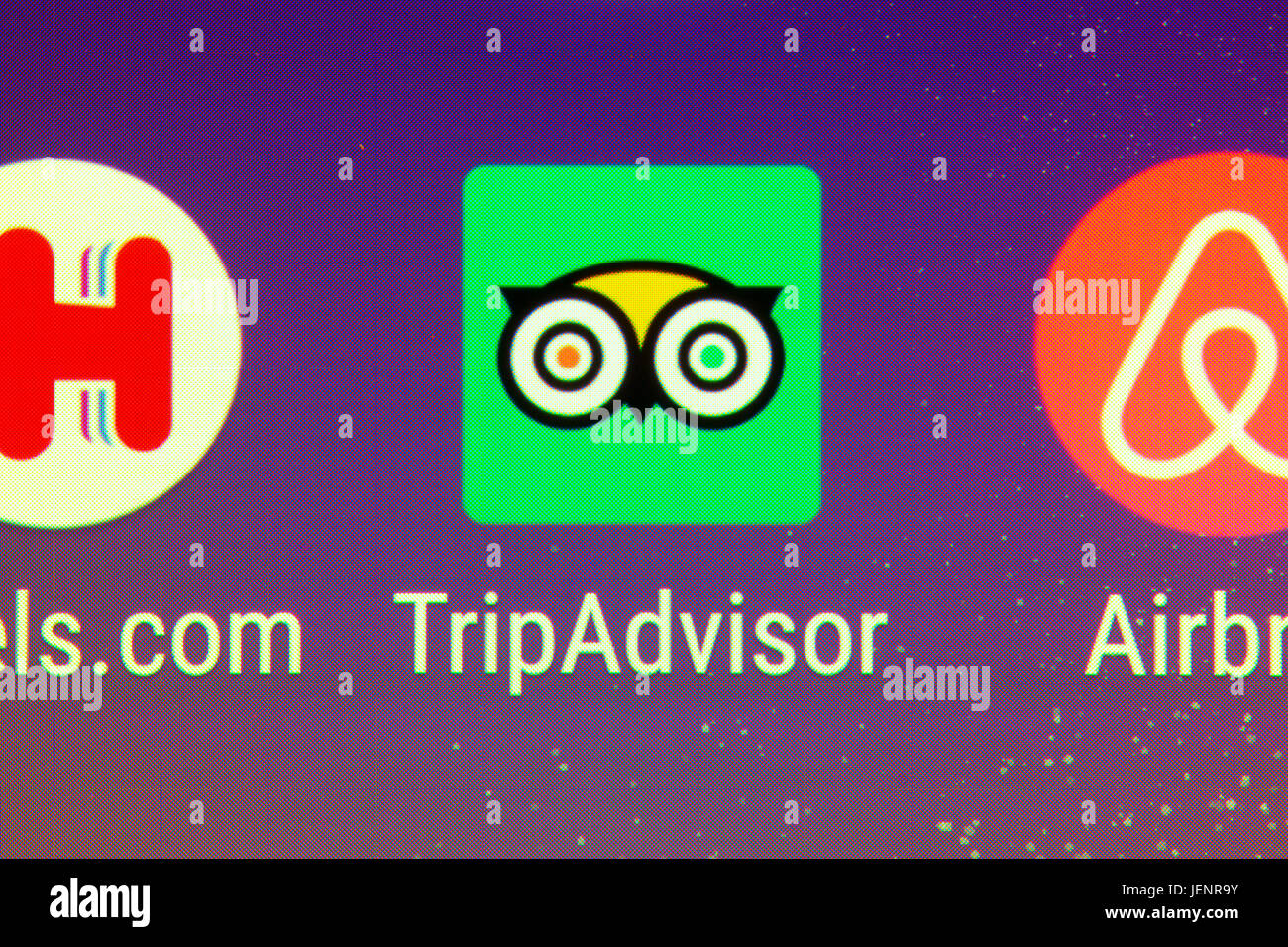 A closeup of the TripAdvisor app on a smartphone Stock Photo