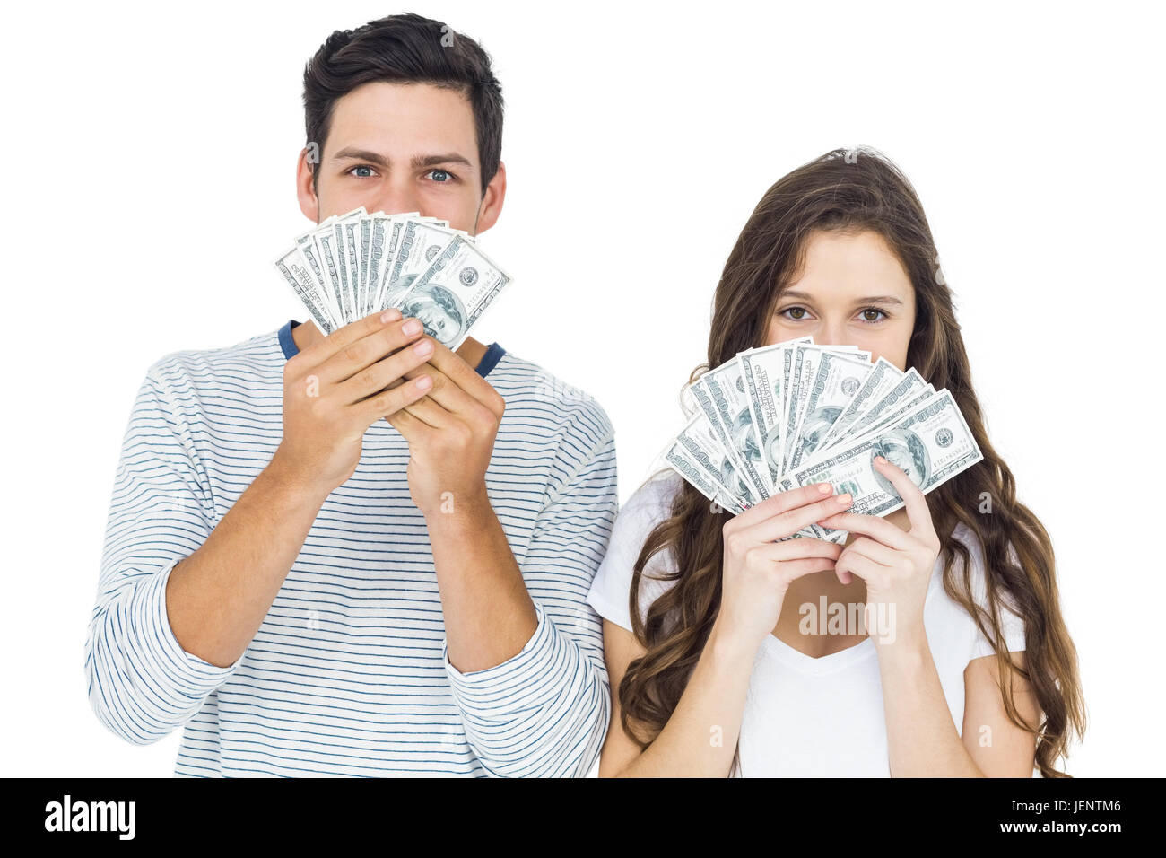 Happy couple holding money Stock Photo - Alamy