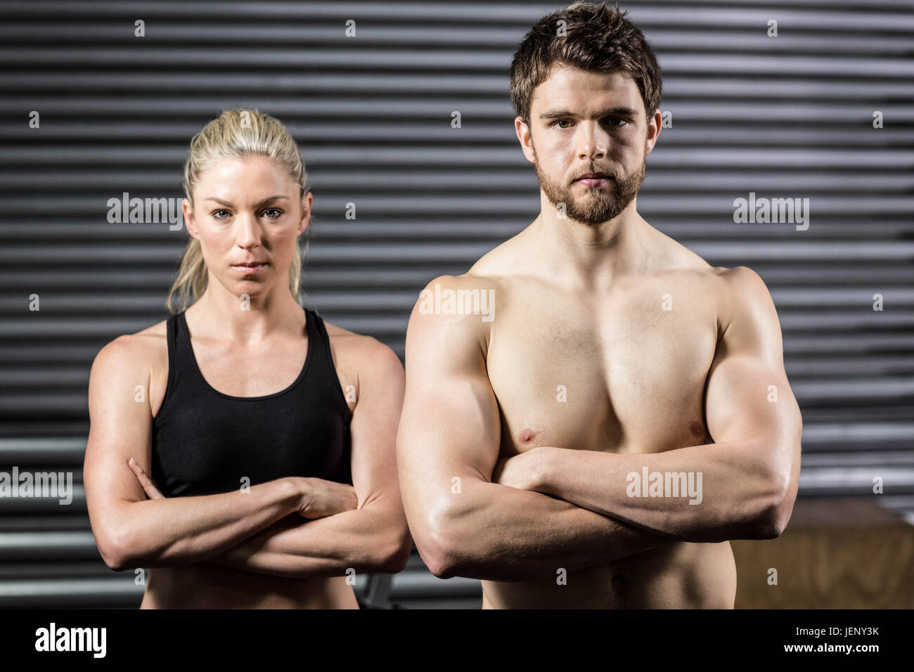 Serious crossfit couple posing Stock Photo - Alamy