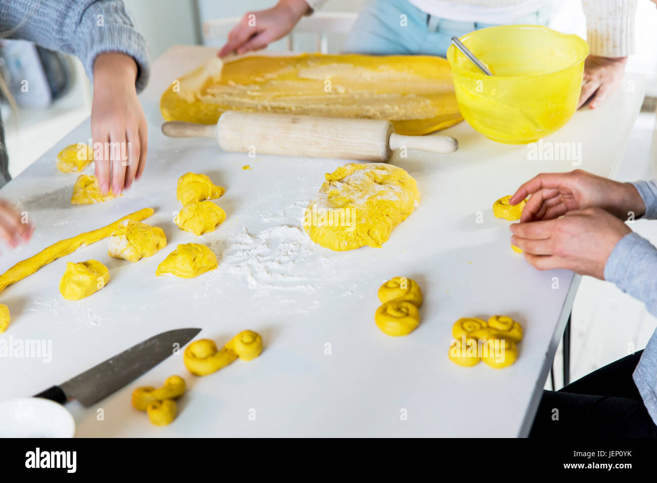 Children making saffron rolls Stock Photo Alamy