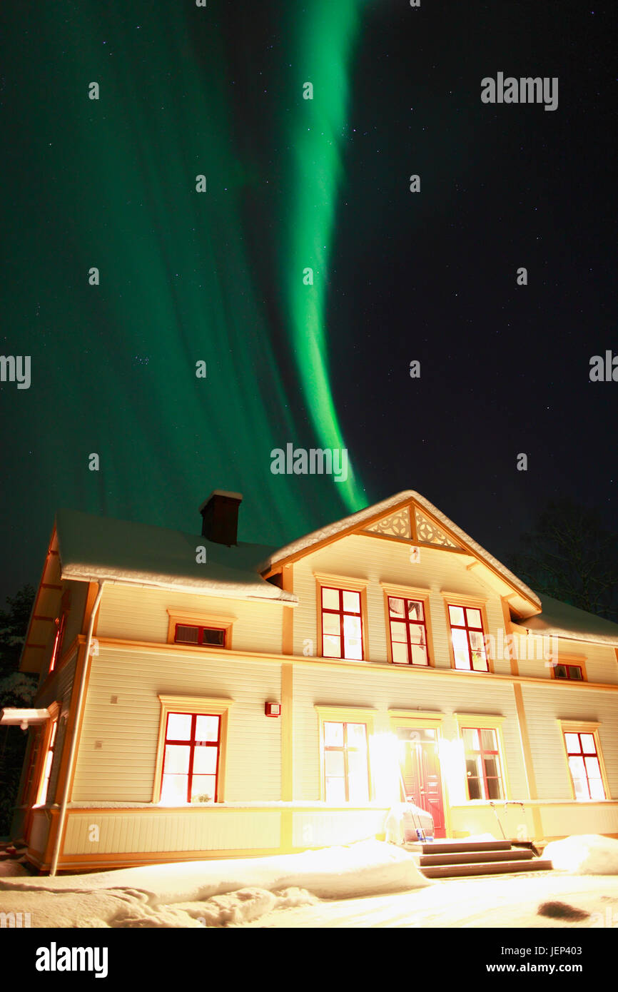 Aurora borealis above house Stock Photo - Alamy