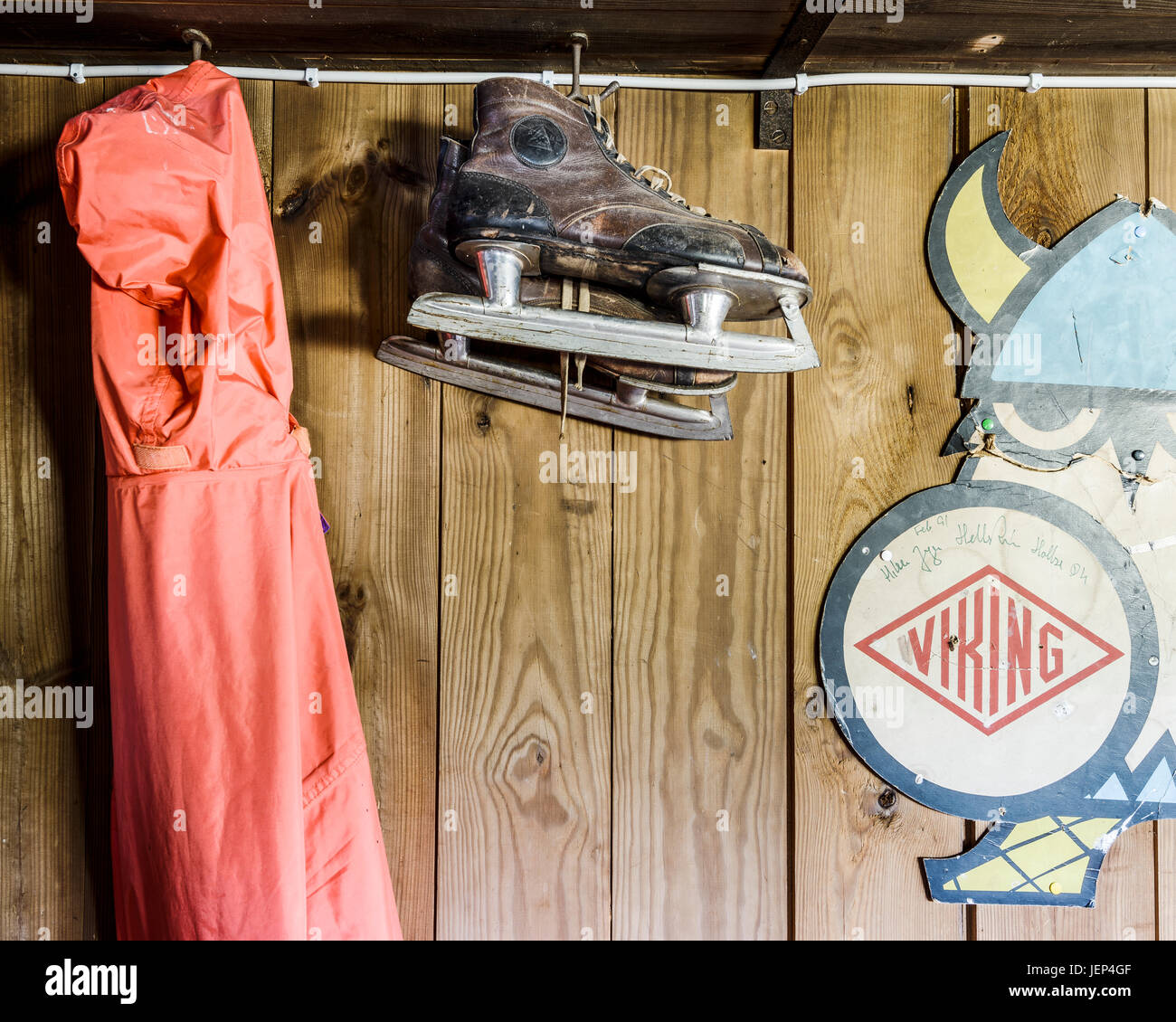 Old ice skates hanging in wooden house Stock Photo Alamy