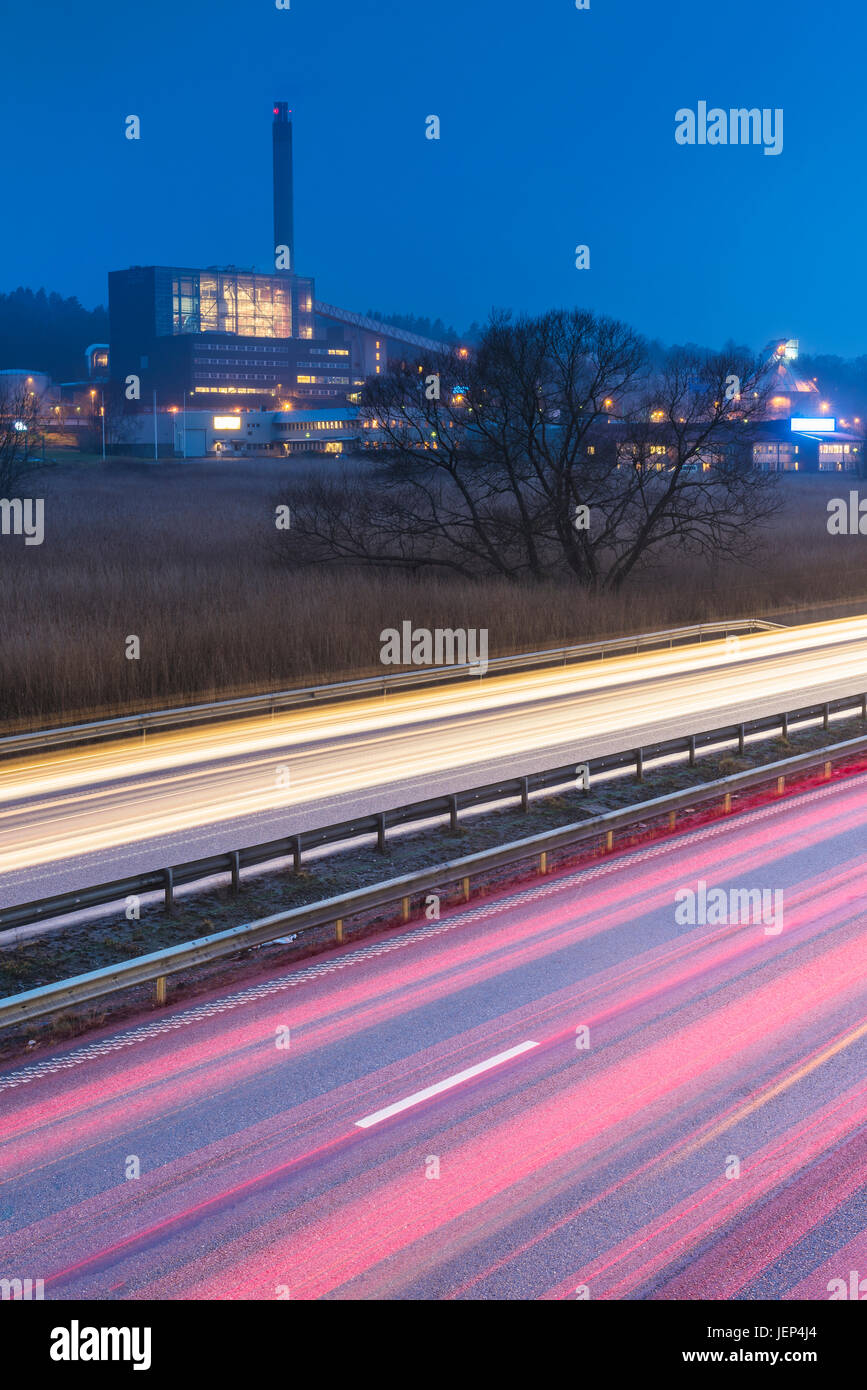 Car lights on road at night Stock Photo Alamy