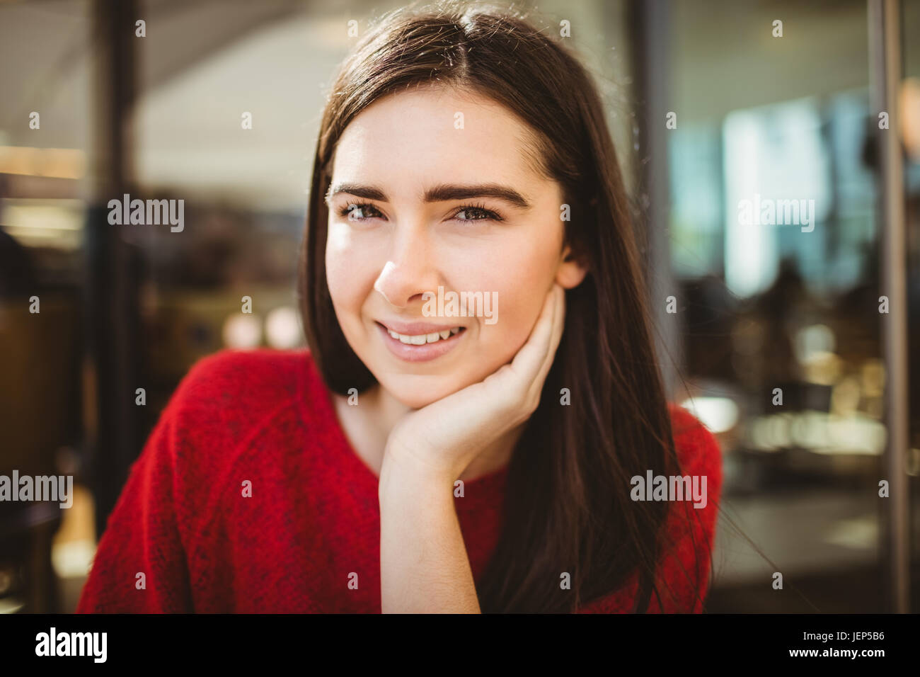 Portrait of smiling woman Stock Photo - Alamy