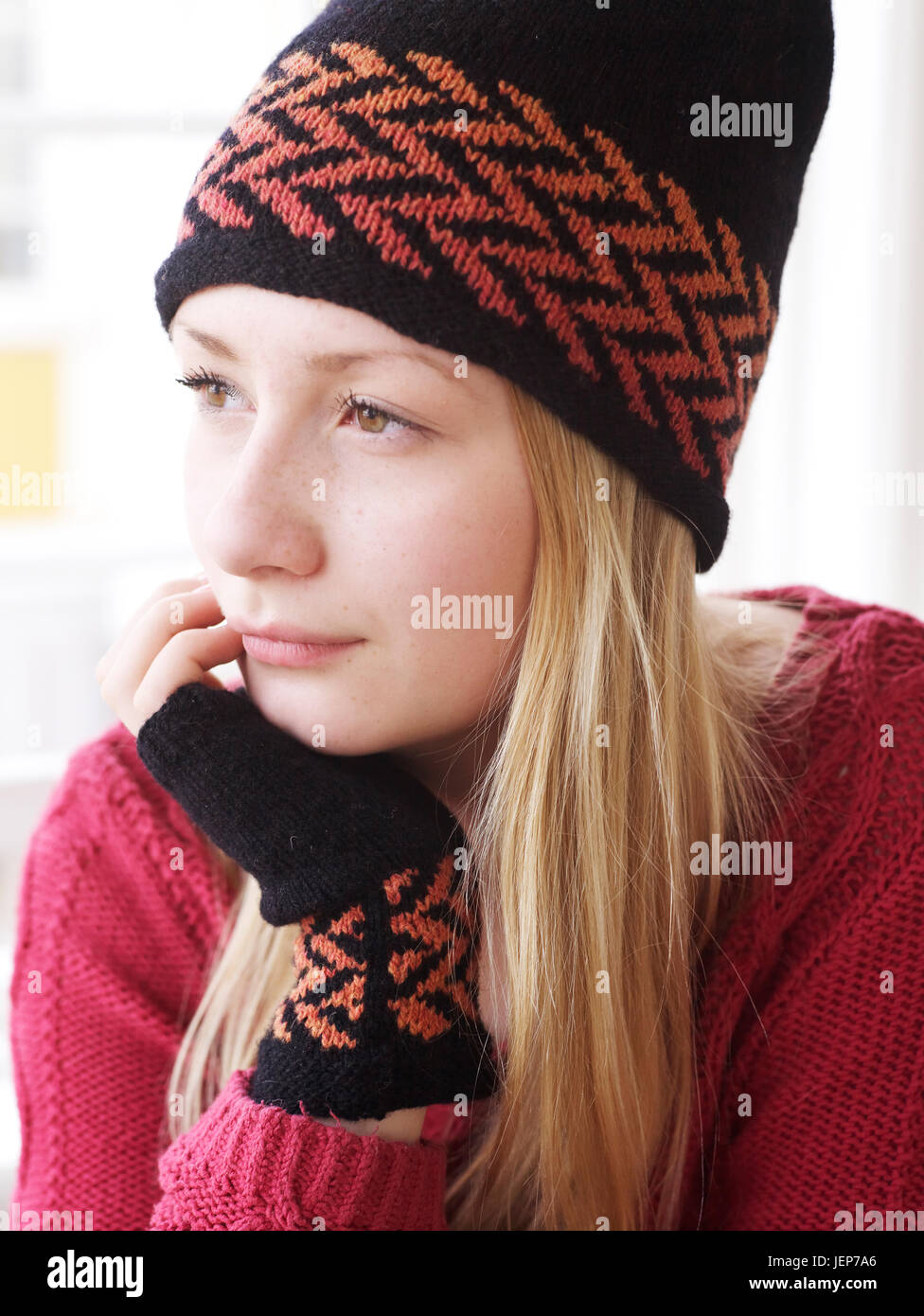 Young woman wearing knitted hat Stock Photo Alamy