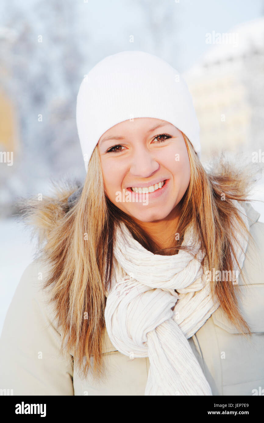 Young woman woolly hat smile hi-res stock photography and images - Alamy