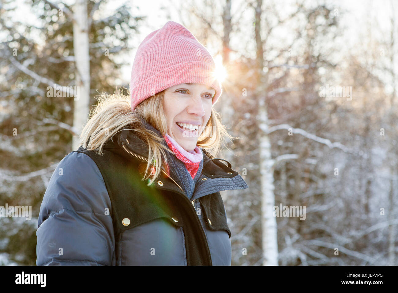 Young woman woolly hat smile hi-res stock photography and images - Alamy