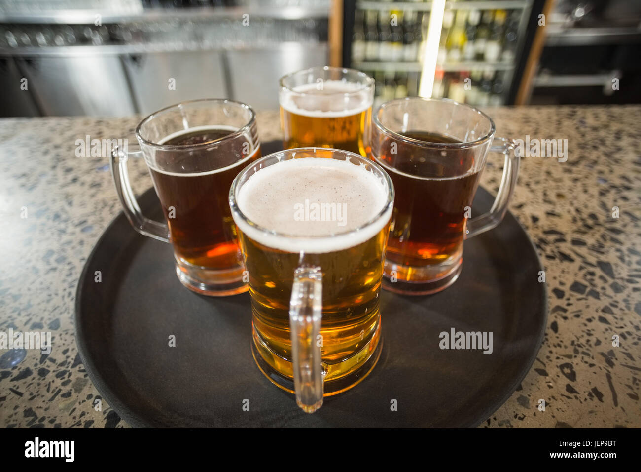 Four glasses of beer Stock Photo - Alamy